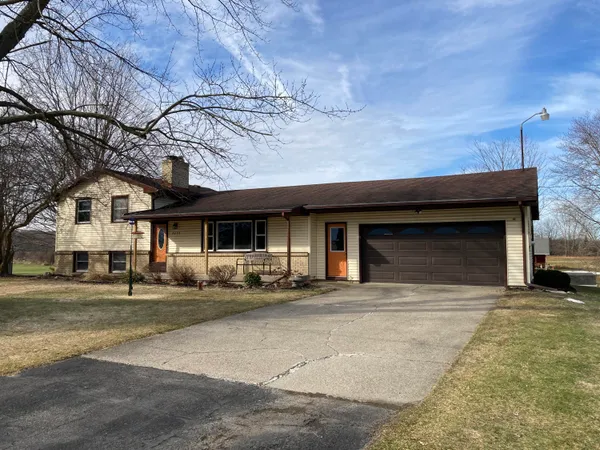 $425,000 | 8453 Hanna Lake Avenue Southeast, Caledonia, MI 49316