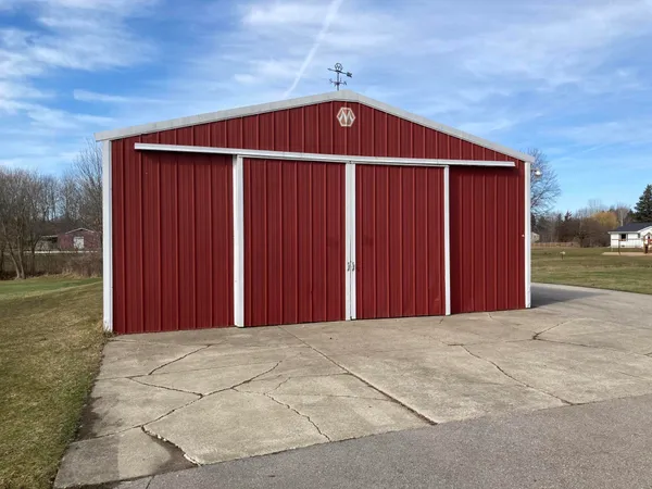 $425,000 | 8453 Hanna Lake Avenue Southeast, Caledonia, MI 49316