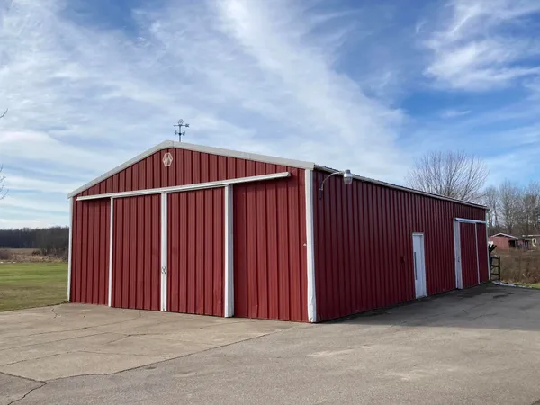 $425,000 | 8453 Hanna Lake Avenue Southeast, Caledonia, MI 49316