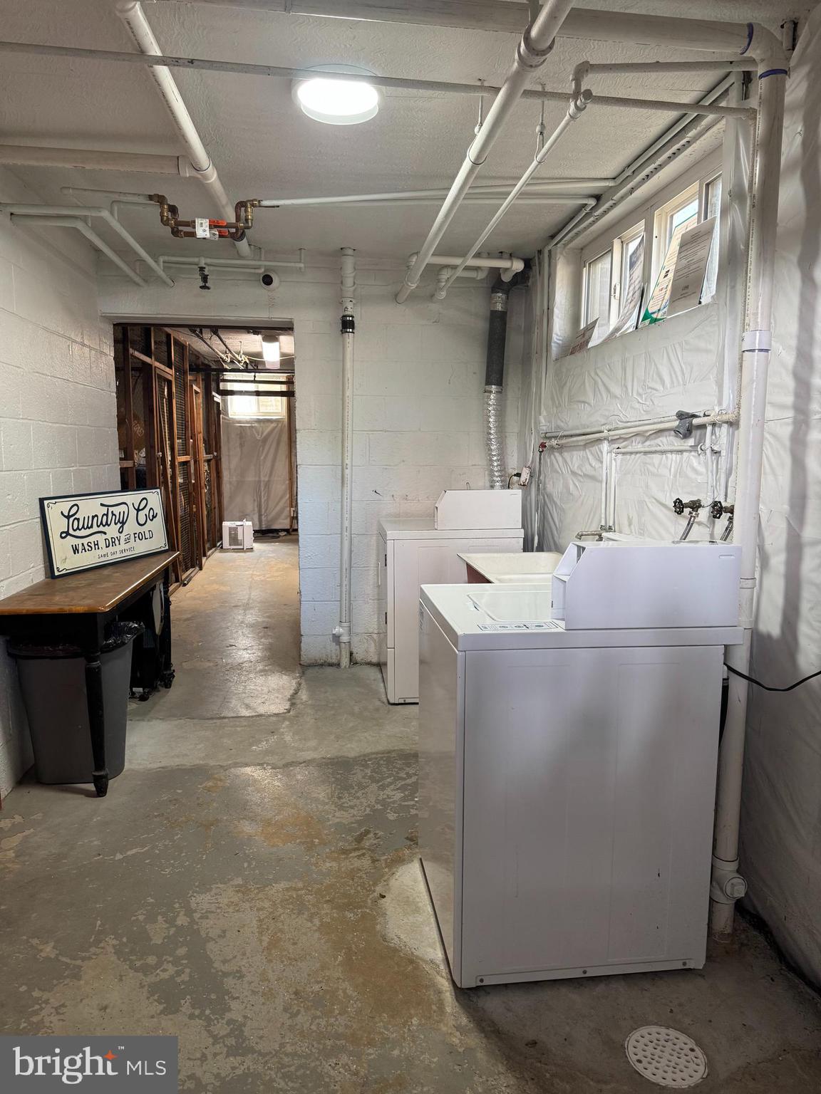 1510 North Rolfe Street, Unit 4 Arlington, VA 22209 - Photo 9 of 9 a utility room with dryer and washer