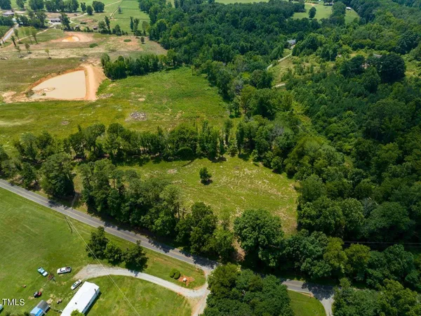 a view of a lake with a yard