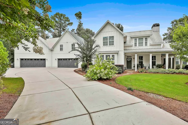 a house with trees in the background