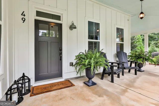 a kitchen with cabinets appliances a sink and a window