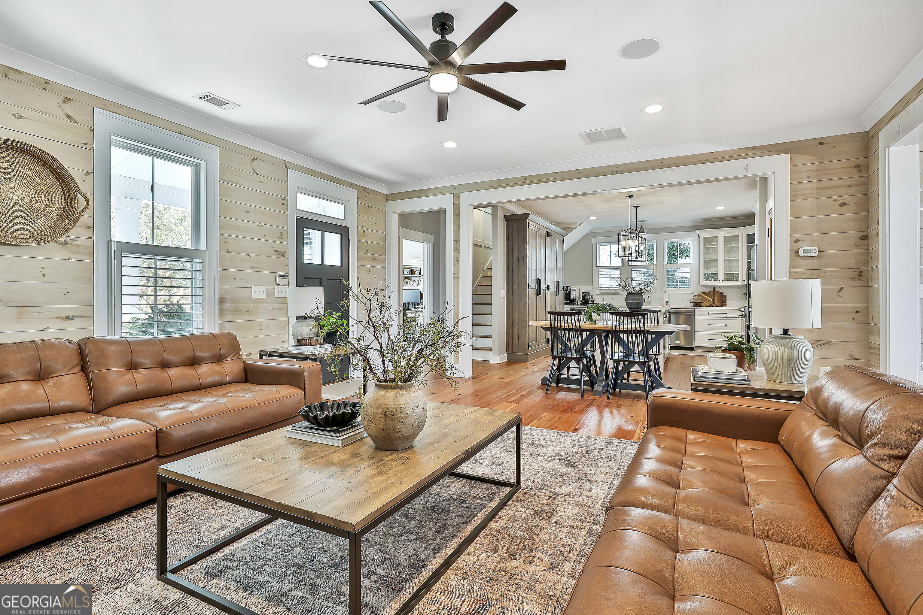 49 Standing Rock Road Senoia, GA 30276 - Photo 28 of 92 a living room with furniture and a large window