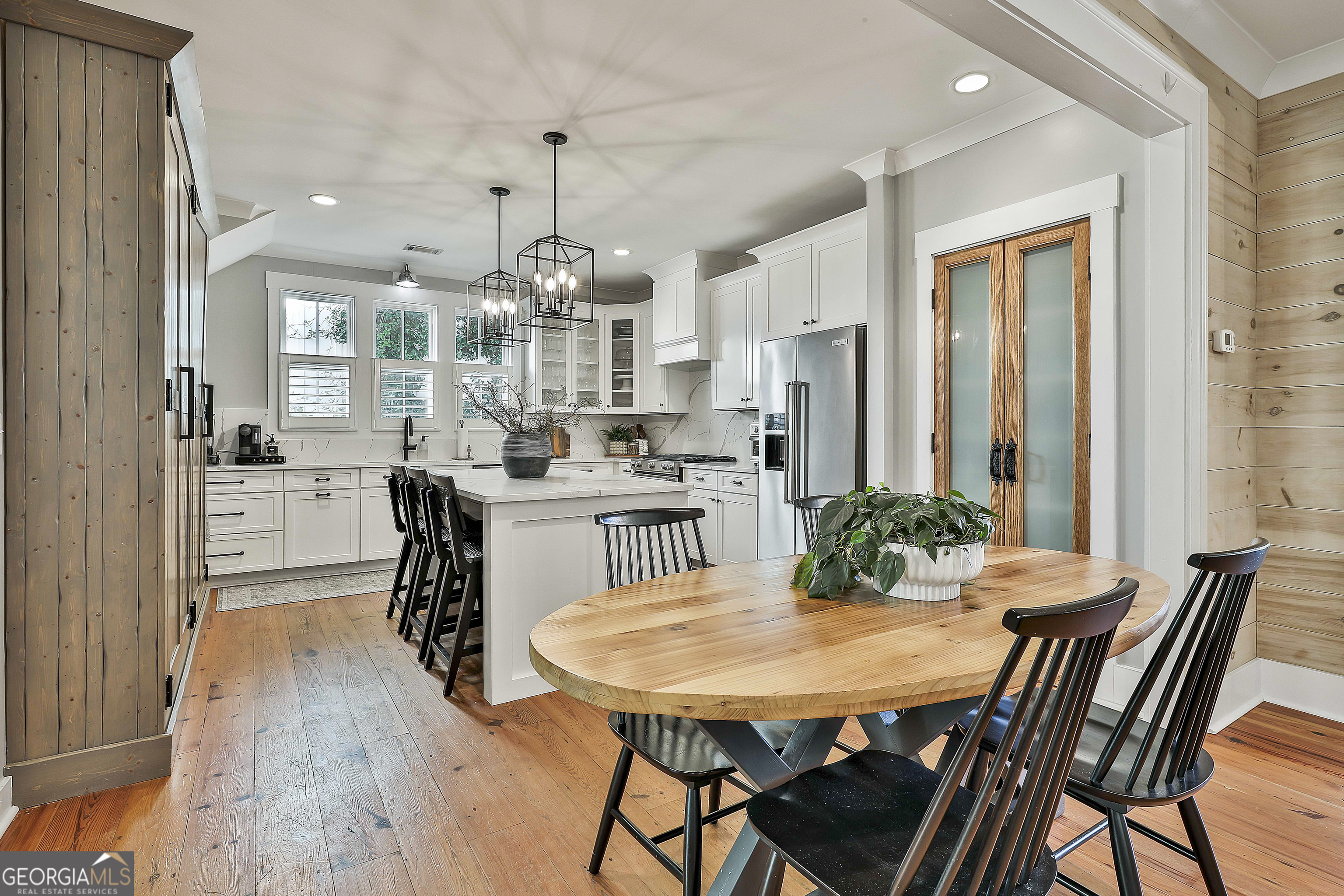 49 Standing Rock Road Senoia, GA 30276 - Photo 30 of 92 a view of a dining room with furniture and wooden floor