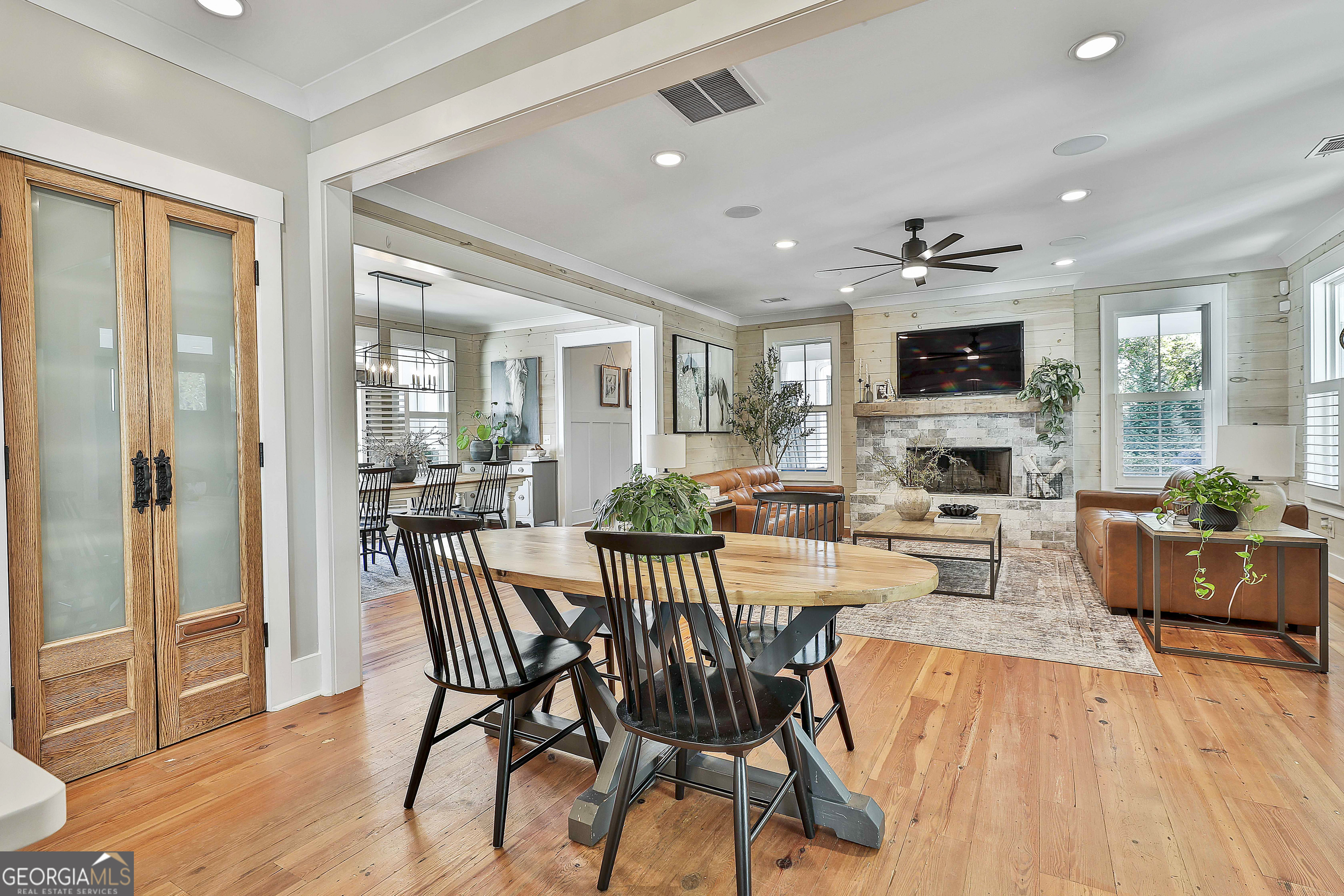 49 Standing Rock Road Senoia, GA 30276 - Photo 38 of 92 a view of a dining room with furniture window and wooden floor