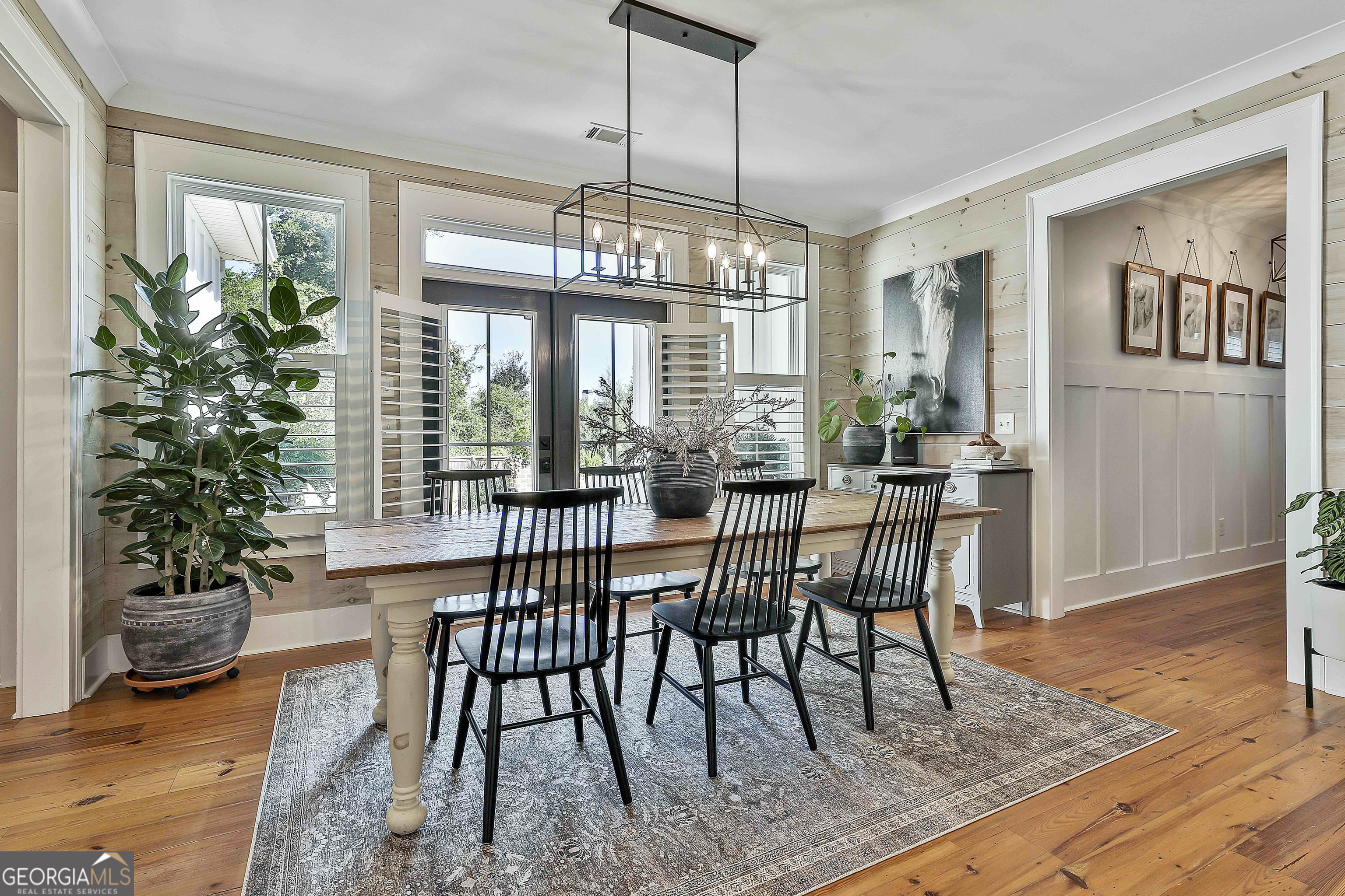 49 Standing Rock Road Senoia, GA 30276 - Photo 39 of 92 a view of a dining room with furniture window and wooden floor