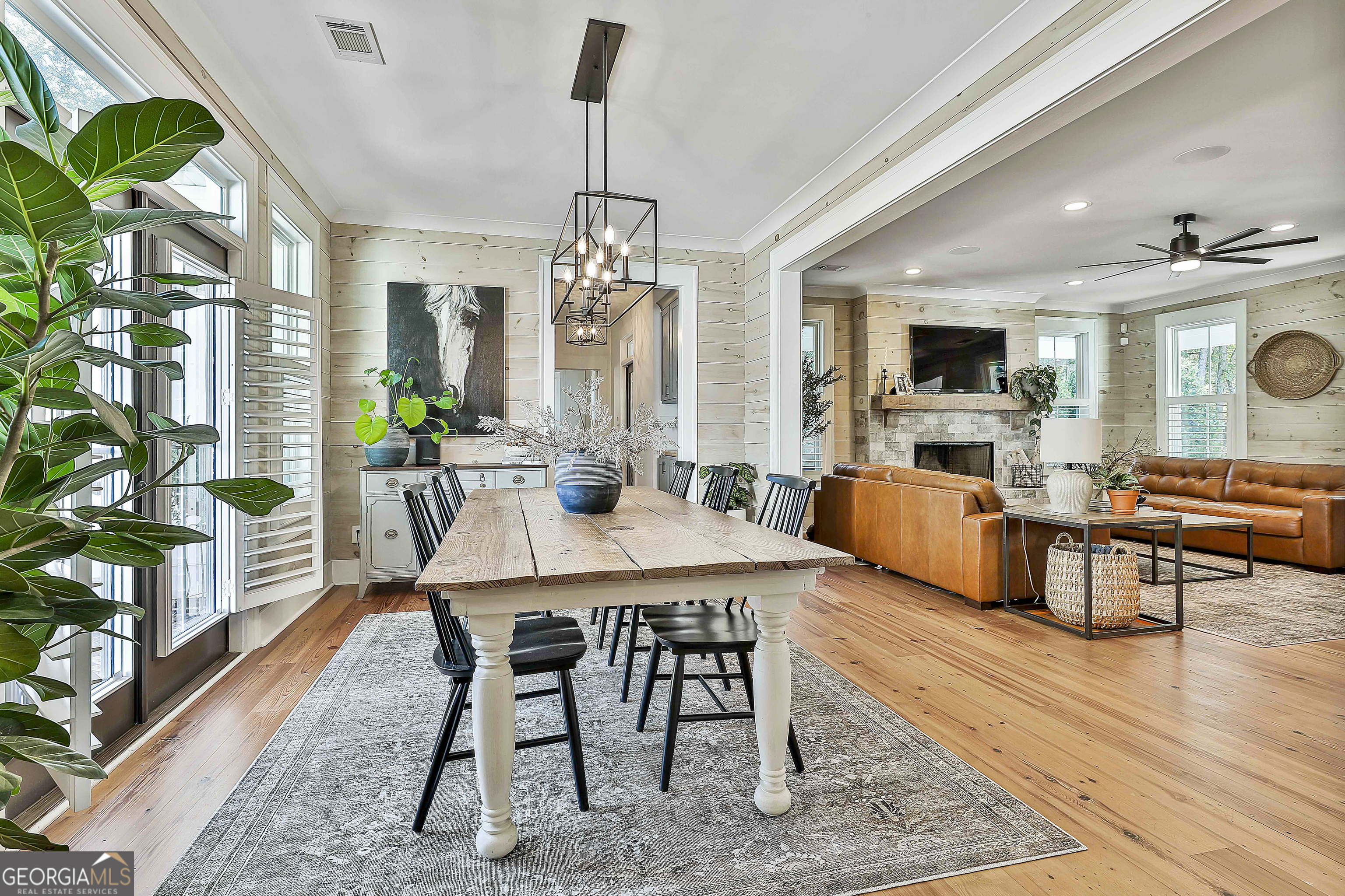 49 Standing Rock Road Senoia, GA 30276 - Photo 40 of 92 a view of a dining room with furniture window and wooden floor