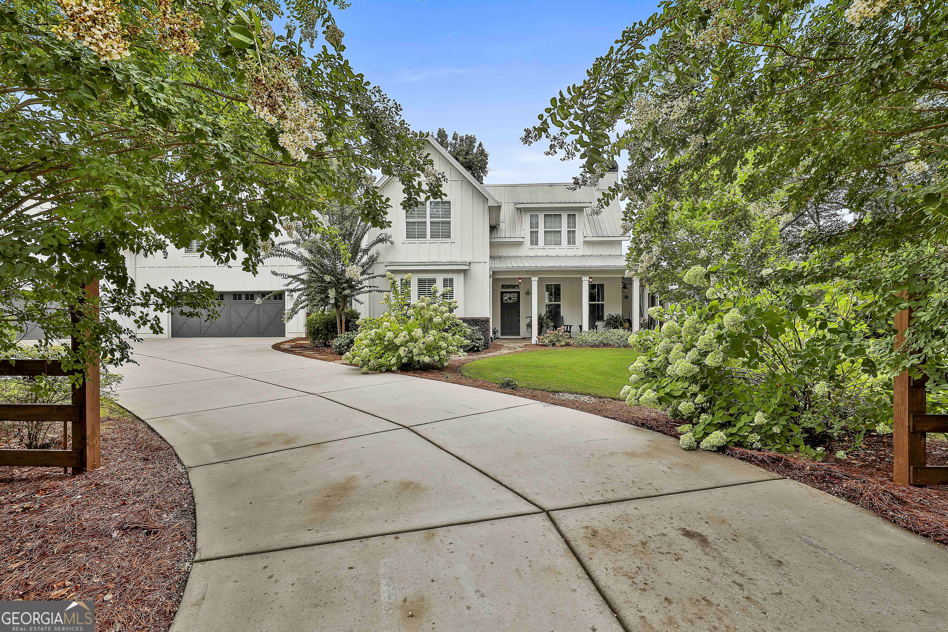 49 Standing Rock Road Senoia, GA 30276 - Photo 4 of 92 a view of house with yard and green space