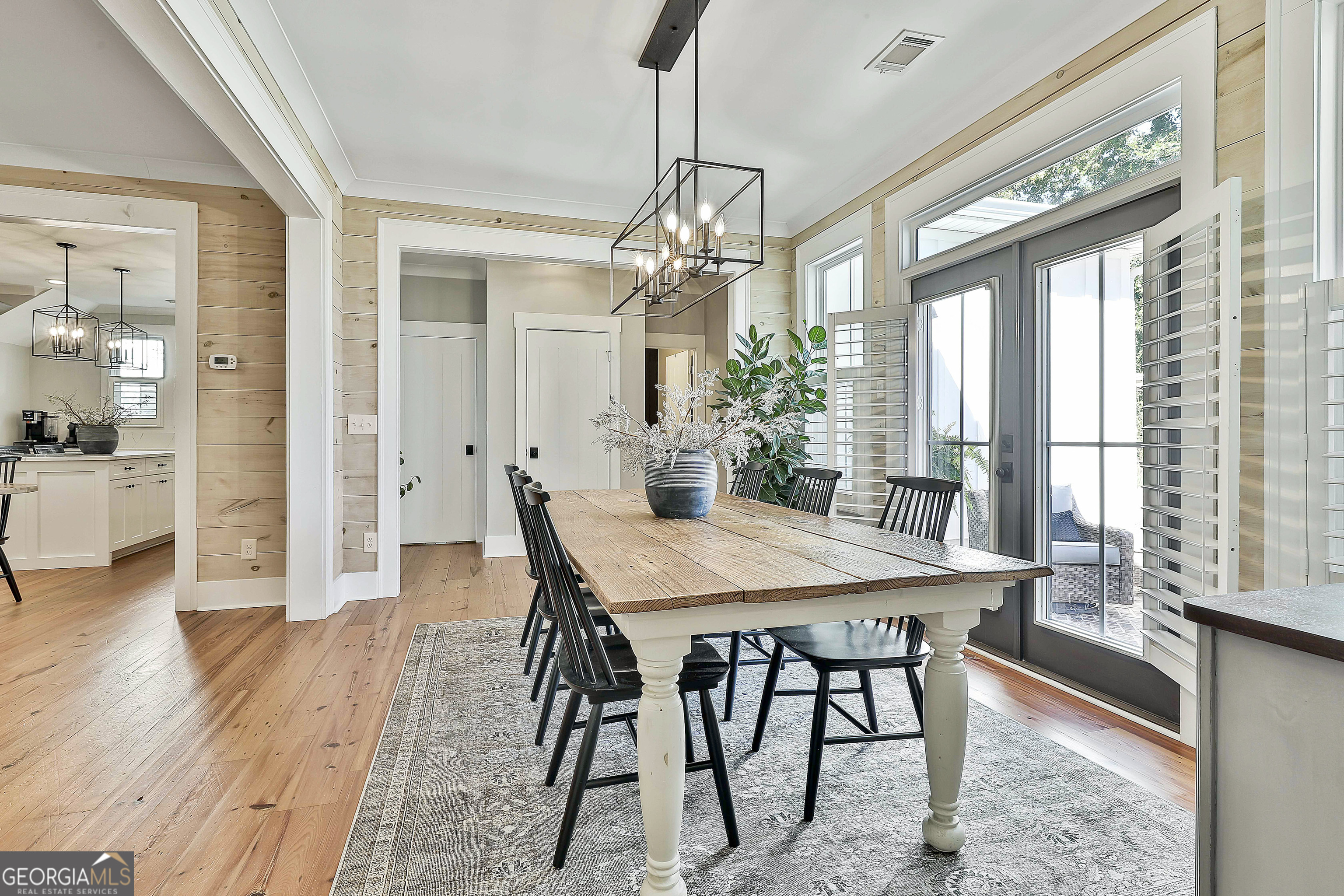 49 Standing Rock Road Senoia, GA 30276 - Photo 41 of 92 a view of a dining room with furniture window and wooden floor