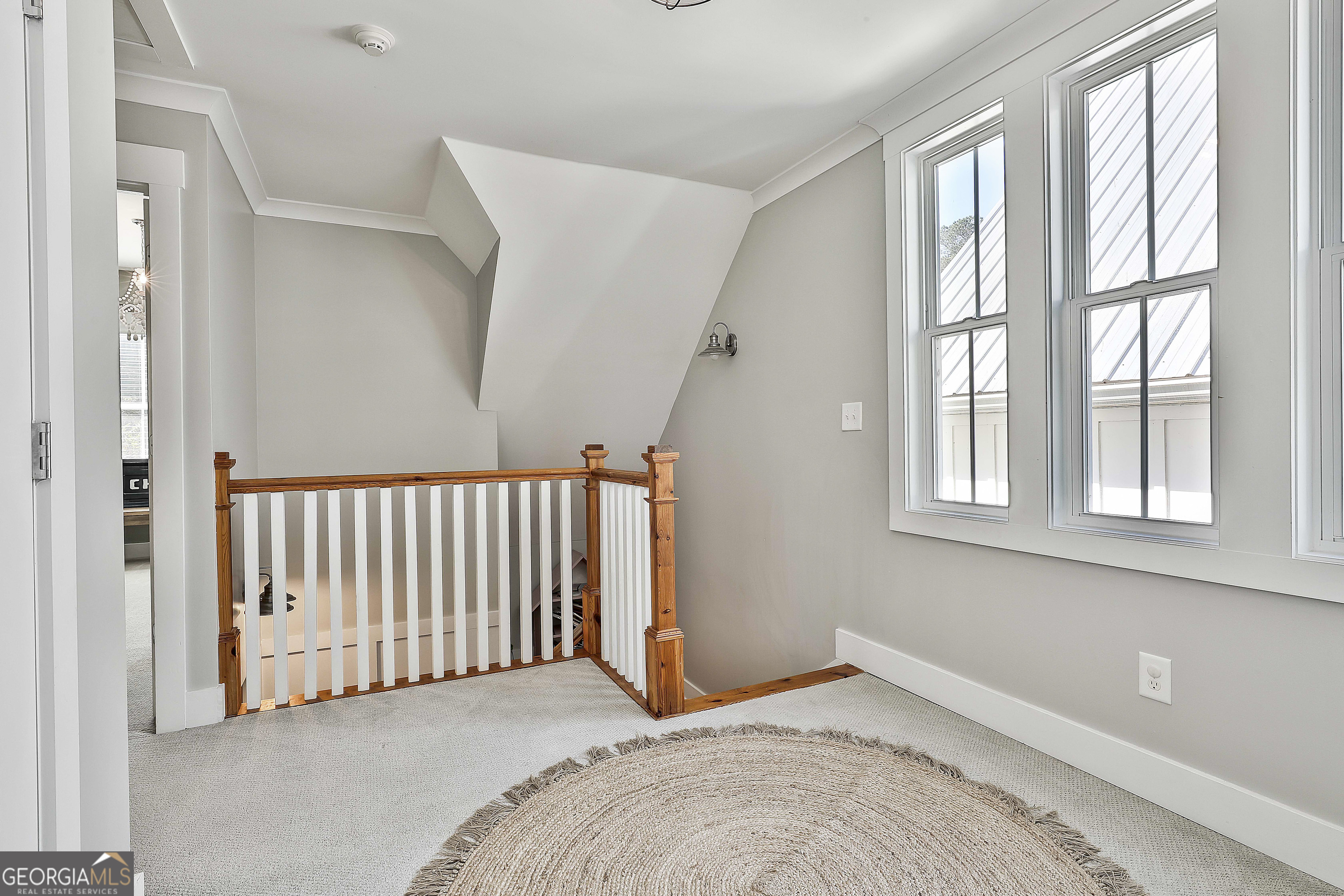 49 Standing Rock Road Senoia, GA 30276 - Photo 56 of 92 a view of a bedroom with a bed and a window
