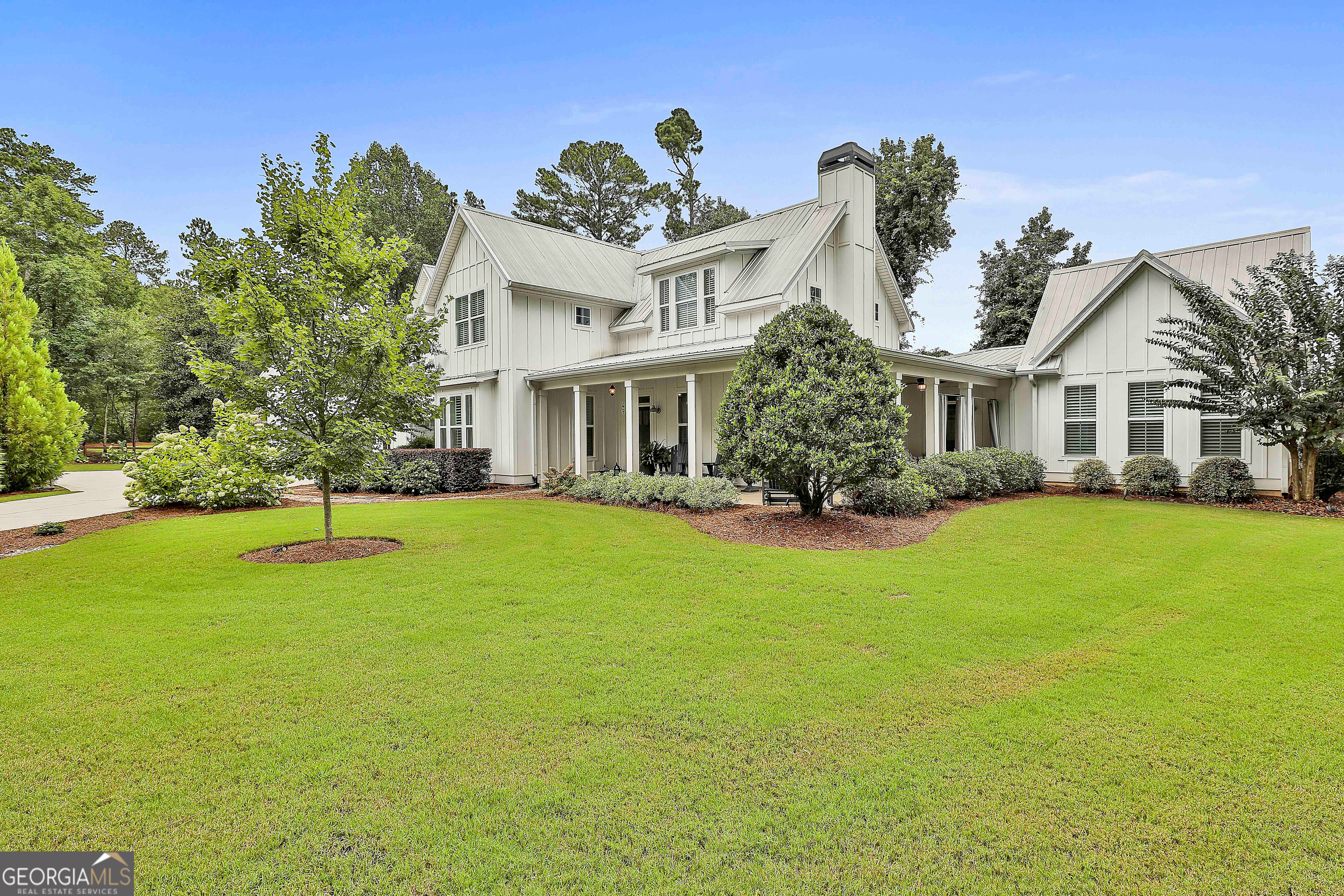 49 Standing Rock Road Senoia, GA 30276 - Photo 7 of 92 a front view of a house with a yard