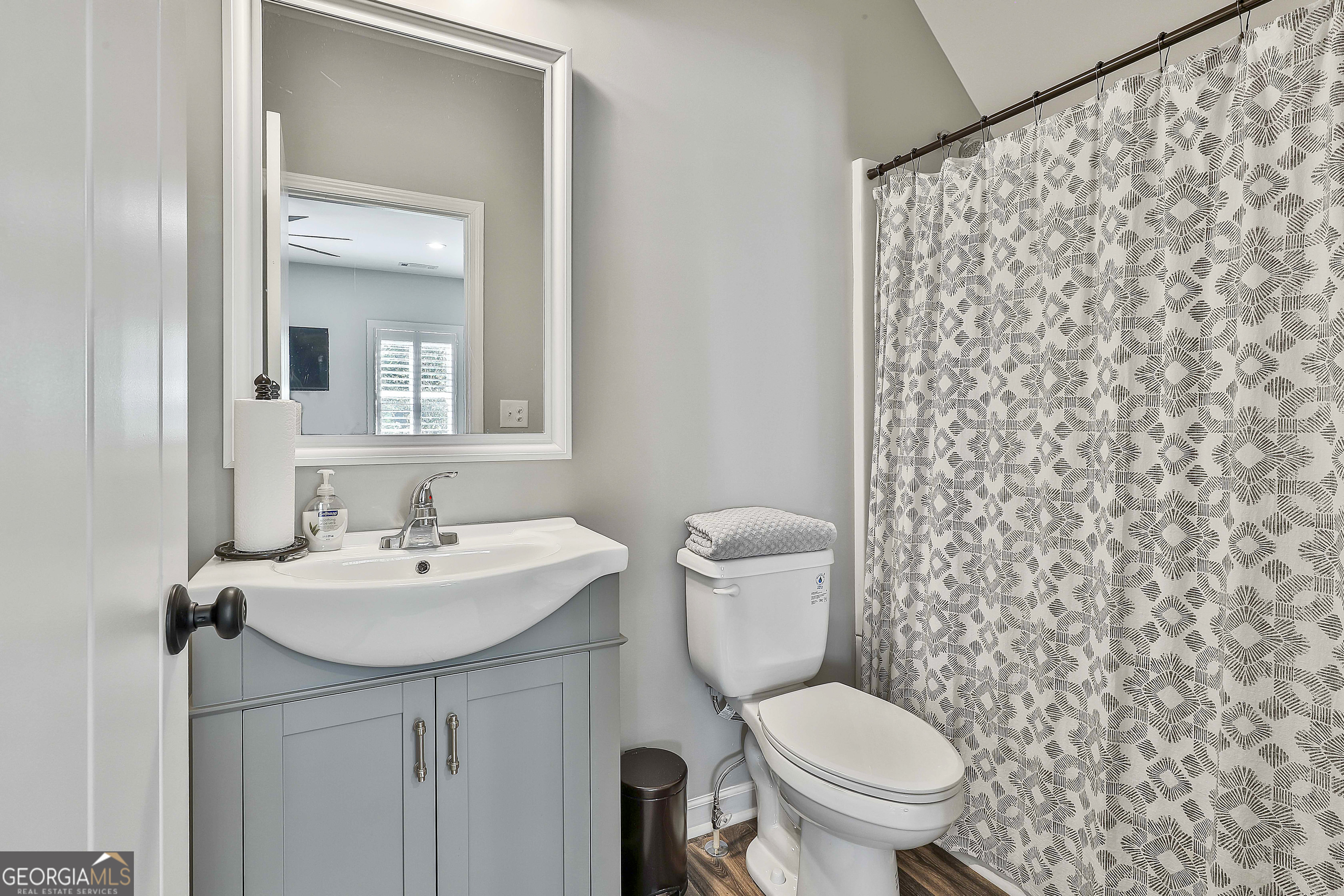 49 Standing Rock Road Senoia, GA 30276 - Photo 71 of 92 a bathroom with a toilet sink and mirror