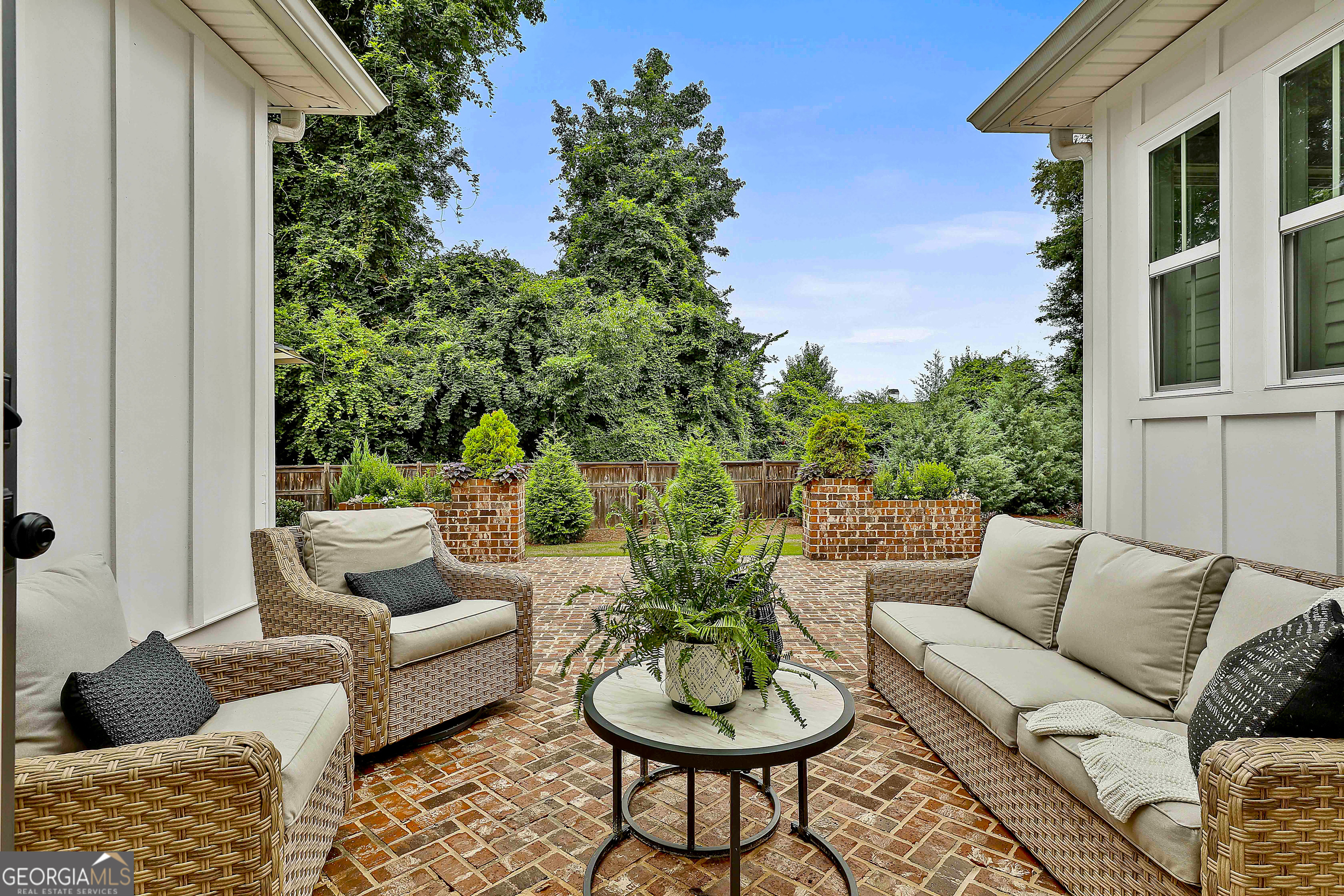 49 Standing Rock Road Senoia, GA 30276 - Photo 78 of 92 a outdoor living room with furniture and a potted plant