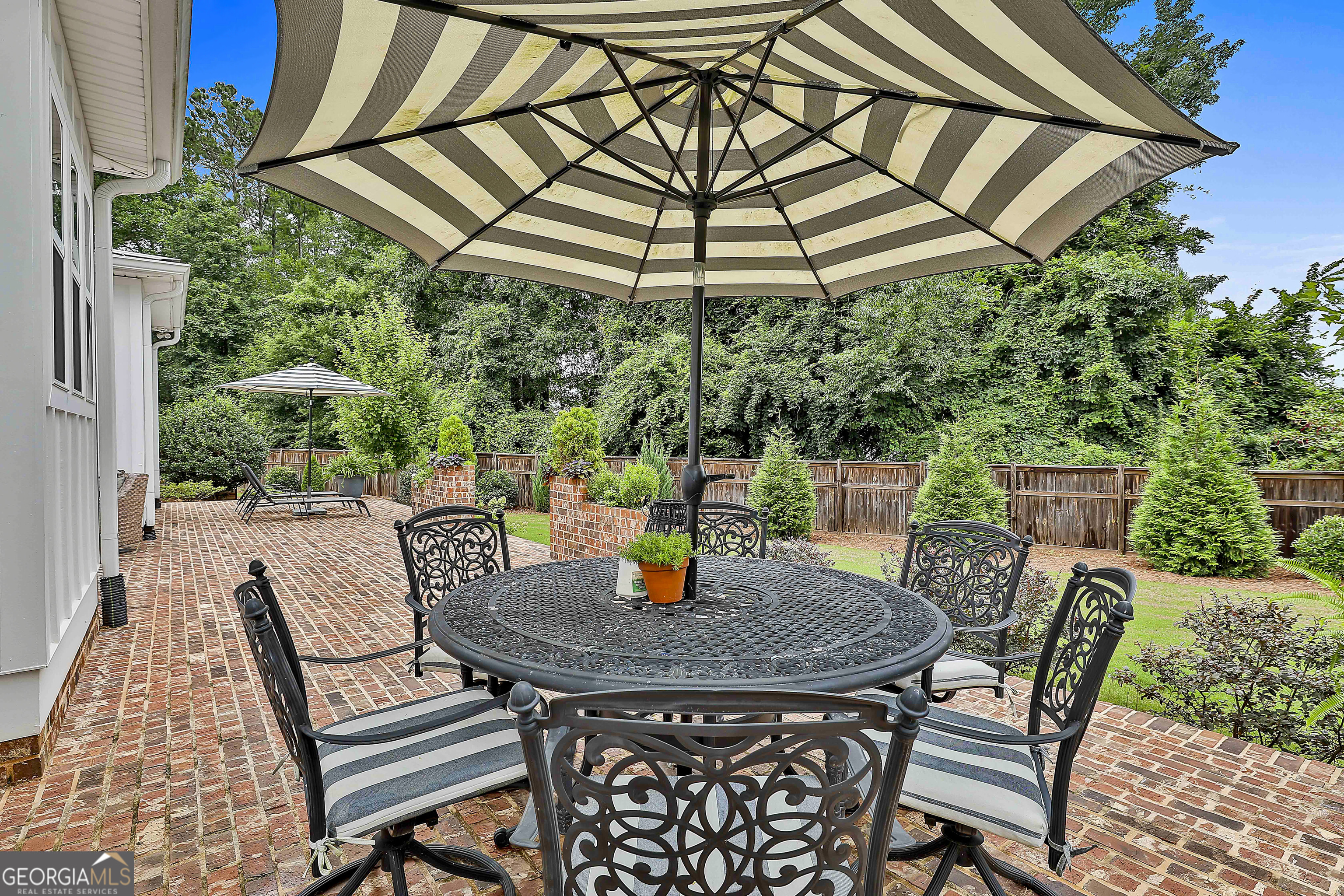 49 Standing Rock Road Senoia, GA 30276 - Photo 85 of 92 a view of a chairs and table in the patio