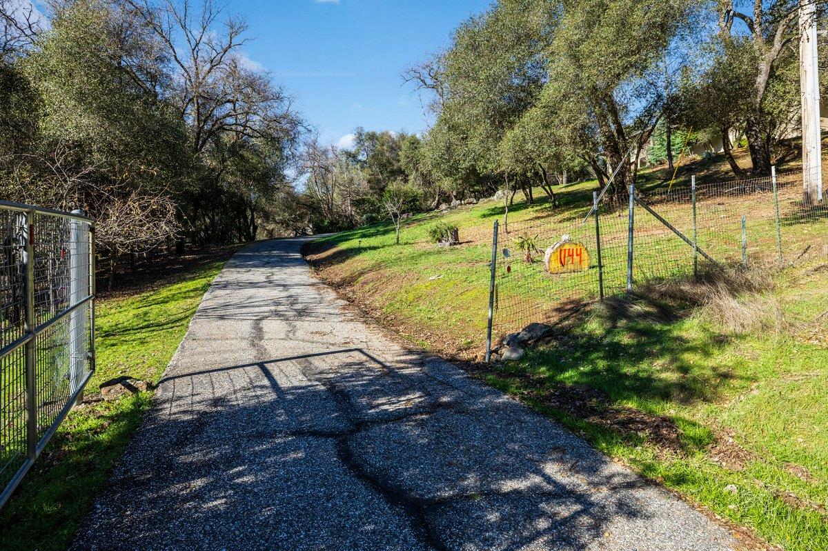 1144 Boole Road Applegate, CA 95703 - Photo 19 of 65 a view of a backyard with swimming pool