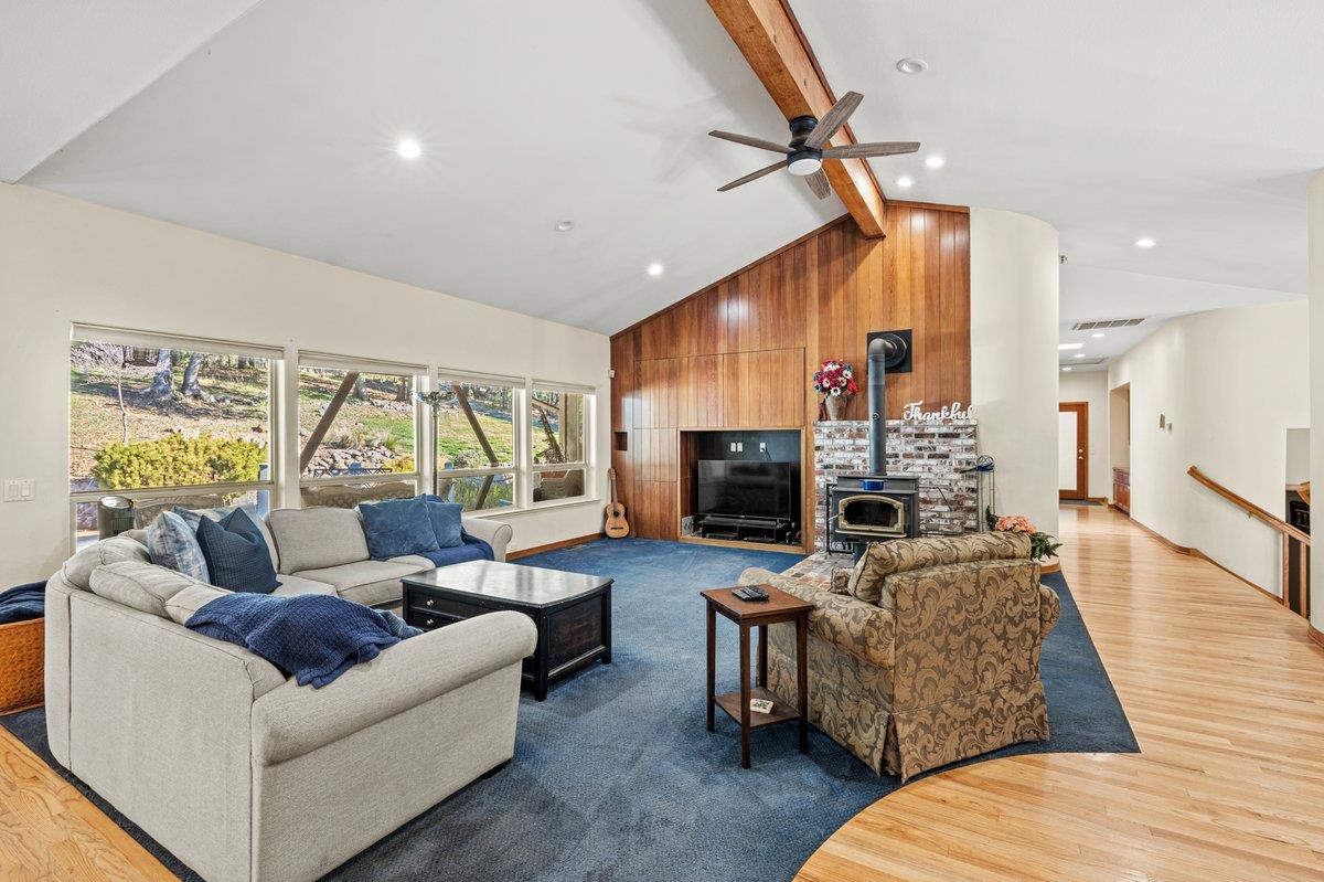 1144 Boole Road Applegate, CA 95703 - Photo 28 of 65 a living room with fireplace furniture and a wooden floor