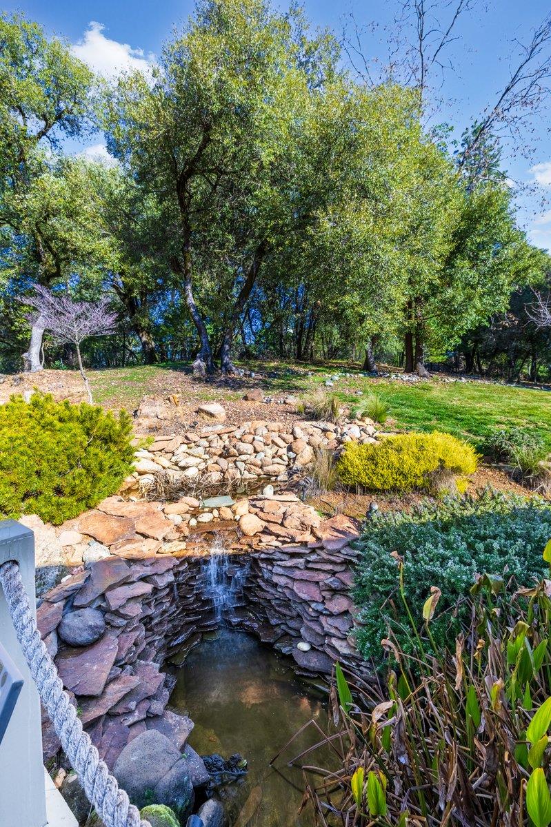 1144 Boole Road Applegate, CA 95703 - Photo 8 of 65 a view of a lake with a yard