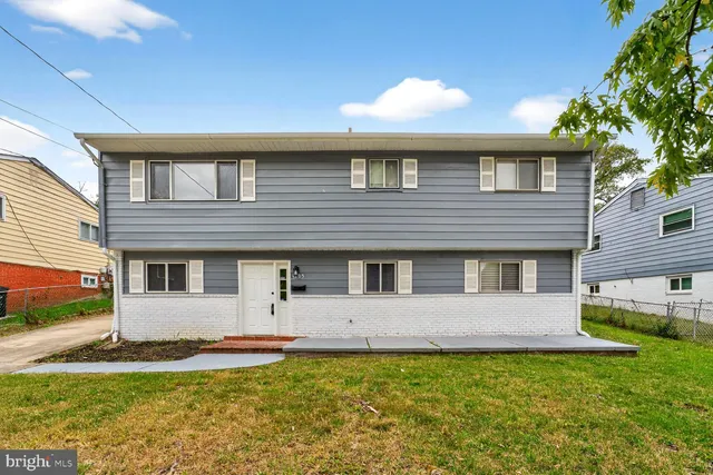 a view of balcony with wooden floor and fence