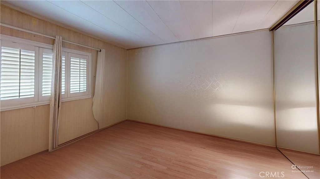 14851 Jeffrey Road, Unit 117 Irvine, CA 92618 - Photo 40 of 45 a view of an empty room with a window