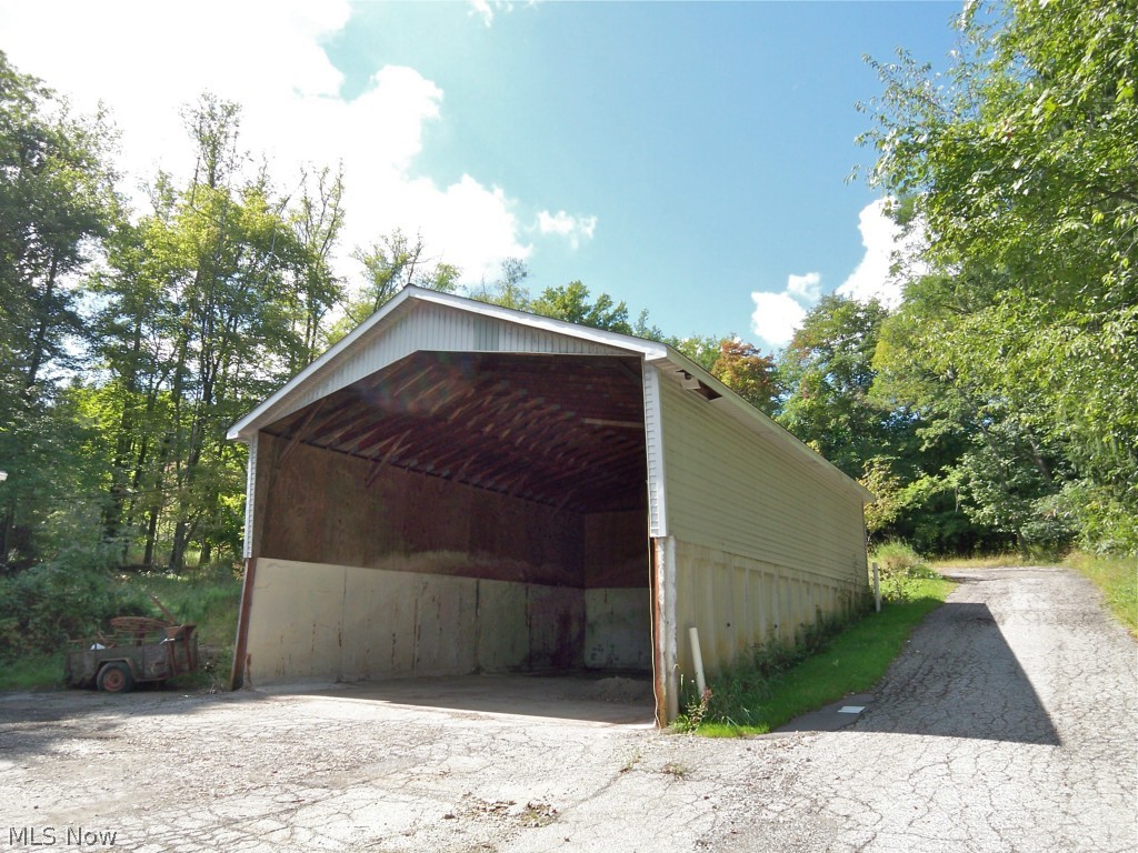 4160 Lander Road Chagrin Falls, OH 44022 - Photo 6 of 16 Former storage area but would accommodate boat or RV parking.