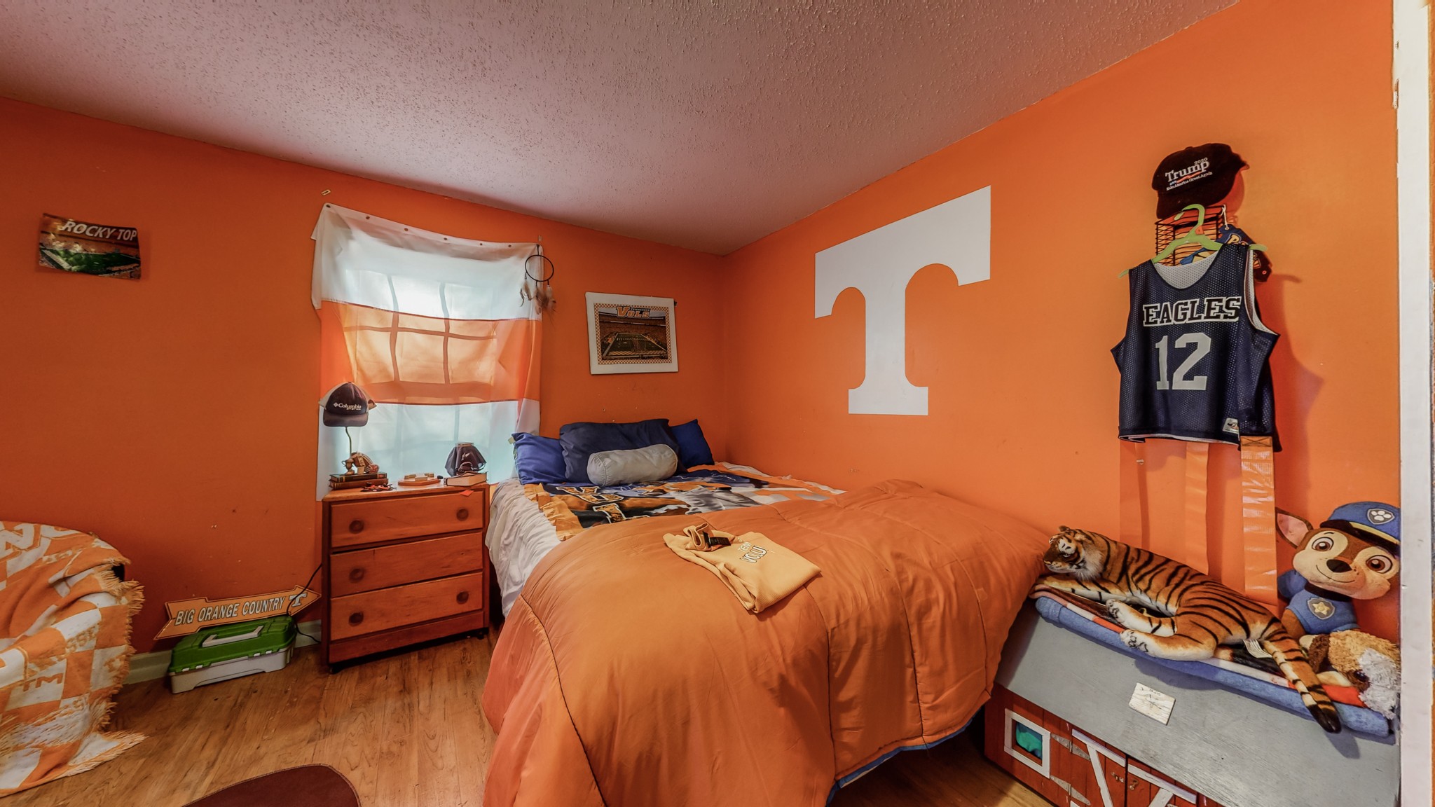 8 Layman Road Elora, TN 37328 - Photo 15 of 34 a bed sitting in a bedroom next to a window