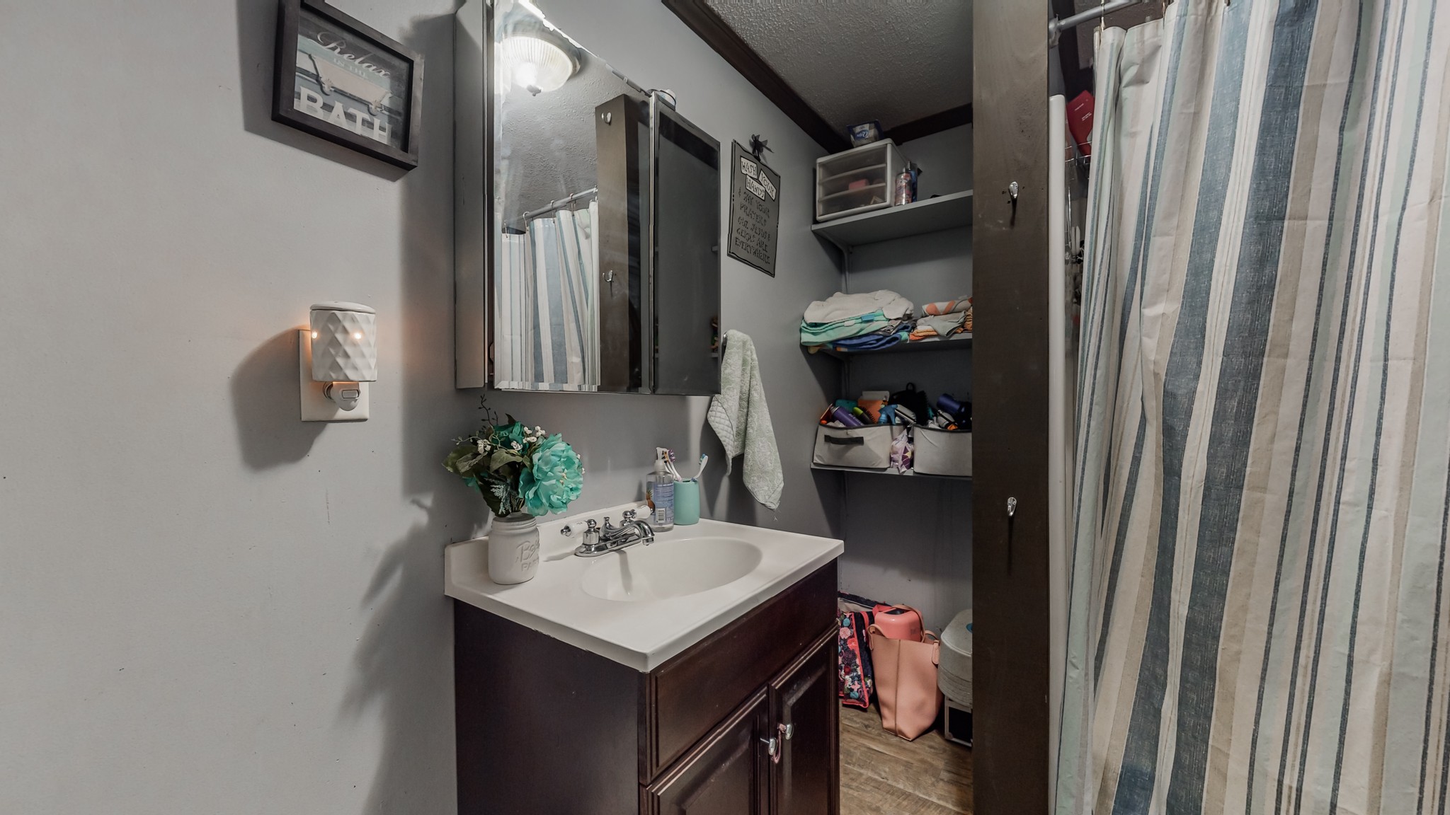 8 Layman Road Elora, TN 37328 - Photo 18 of 34 a bathroom with a sink vanity and a mirror