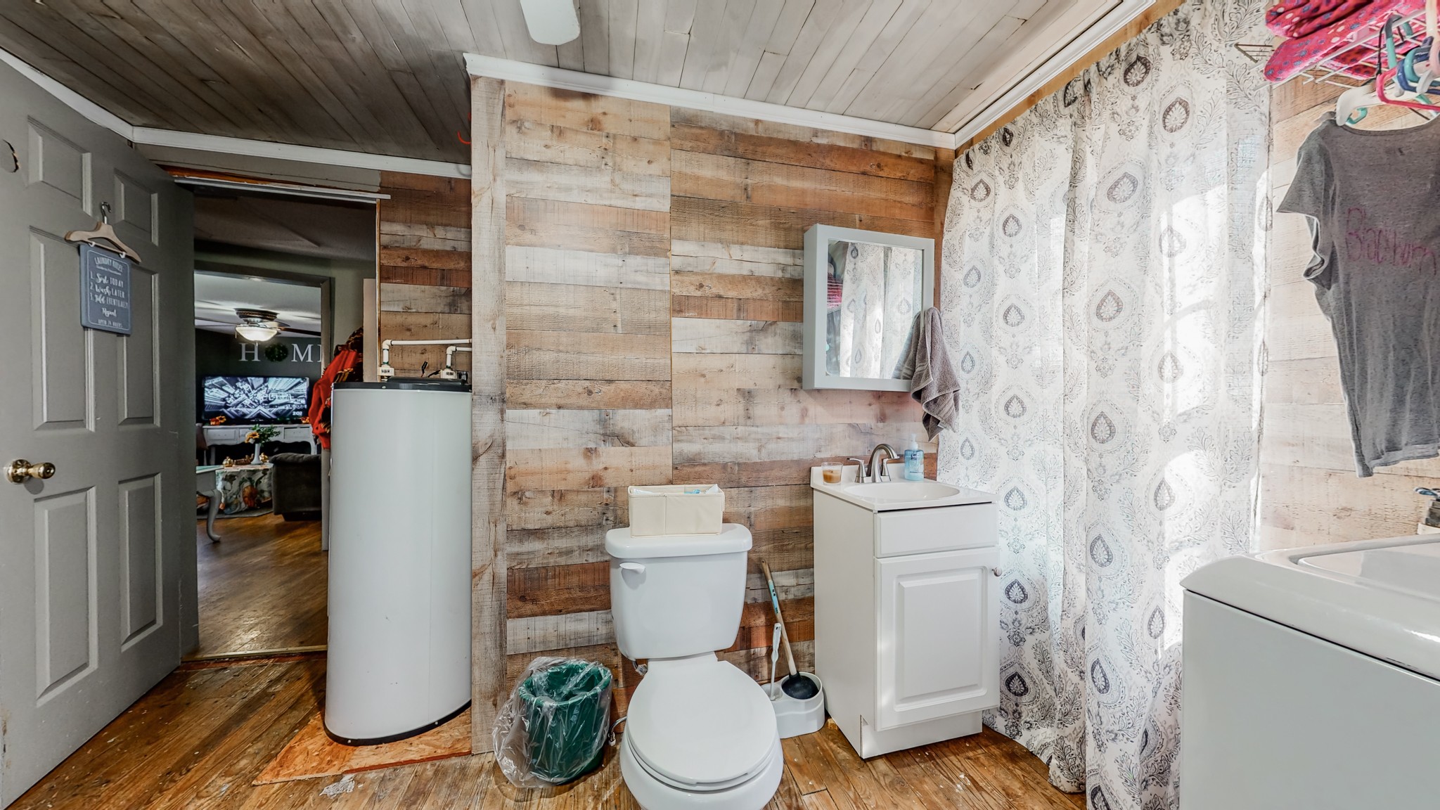 8 Layman Road Elora, TN 37328 - Photo 24 of 34 a white toilet sitting next to a bathroom sink