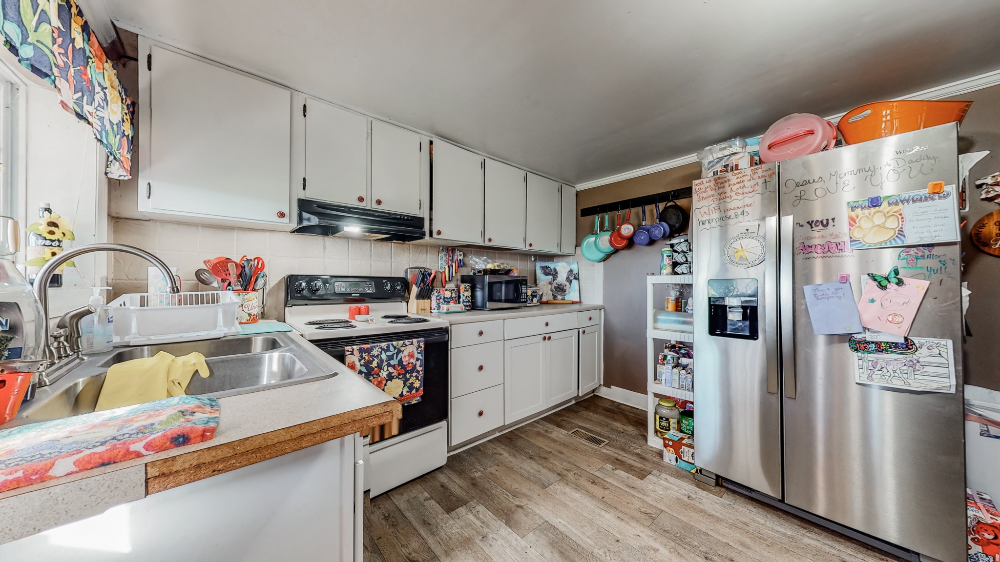 8 Layman Road Elora, TN 37328 - Photo 10 of 34 a kitchen with stainless steel appliances granite countertop a refrigerator sink and cabinets