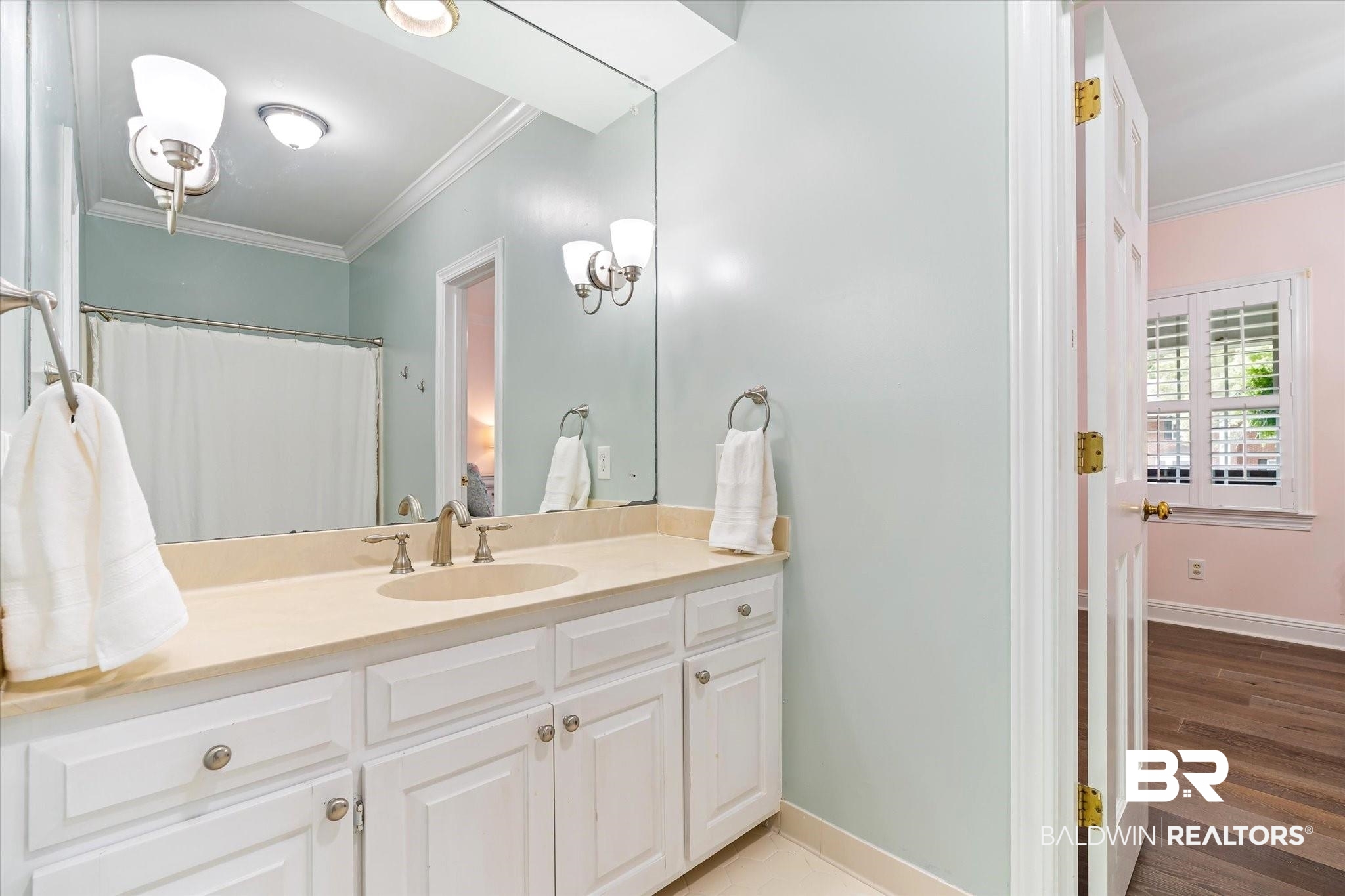 5324 Oak Bend Court Mobile, AL 36609 - Photo 28 of 49 Full bathroom with wood finished floors, vanity, baseboards, and ornamental molding