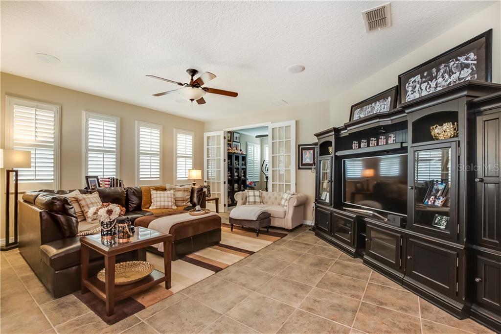 4655 Indian Deer Road Windermere, FL 34786 - Photo 5 of 25 Large family room with french doors to office/den