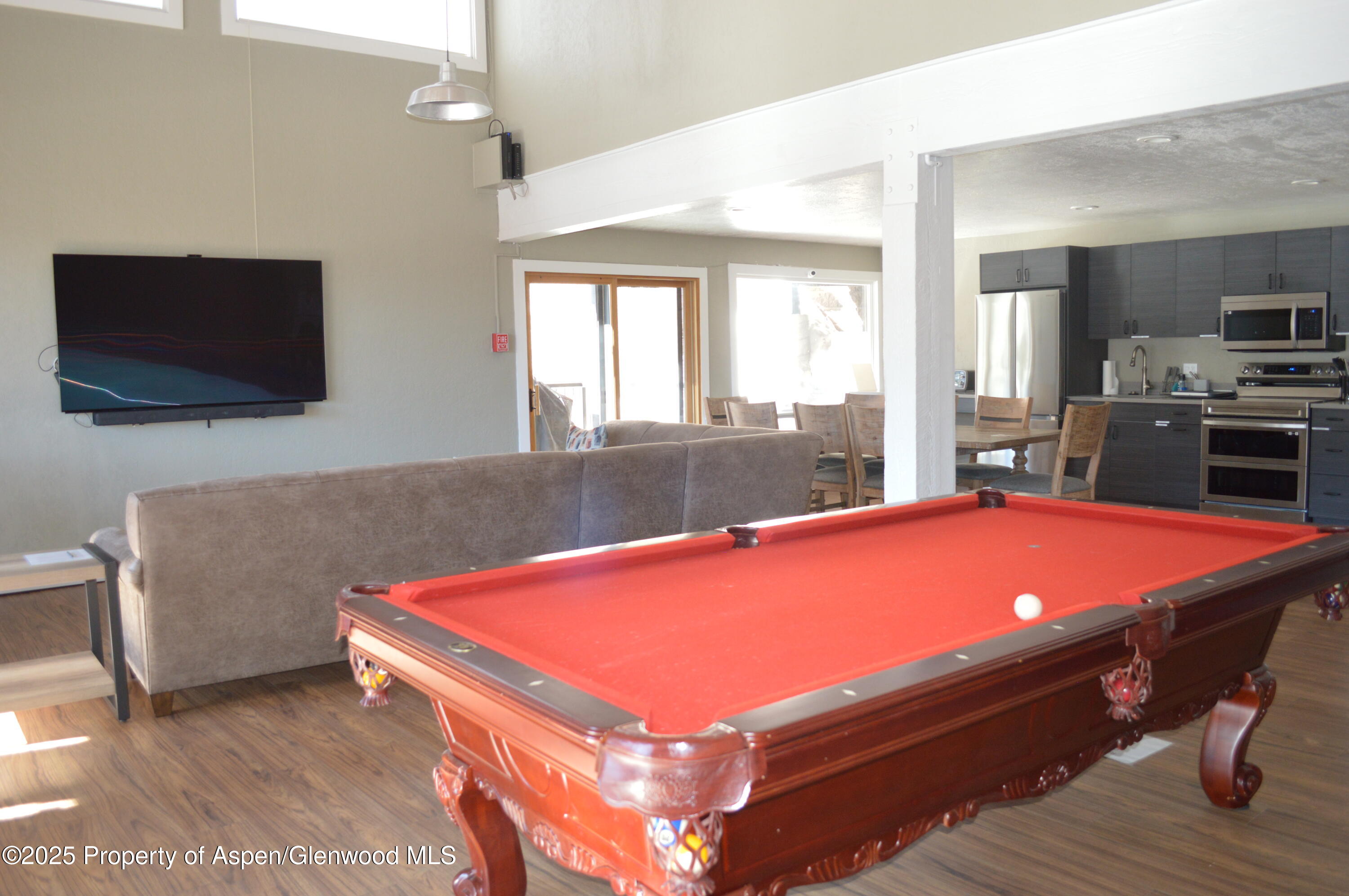 55 Upper Woodbridge Road, Unit J5 Snowmass Village, CO 81615 - Photo 31 of 32 a room with pool table and windows