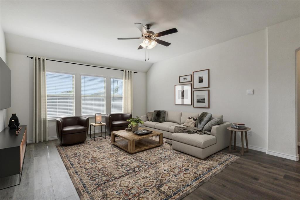 10314 Echo Brk Lane Aubrey, TX 76227 - Photo 5 of 21 Living area with dark wood-type flooring, ceiling fan, and vaulted ceiling