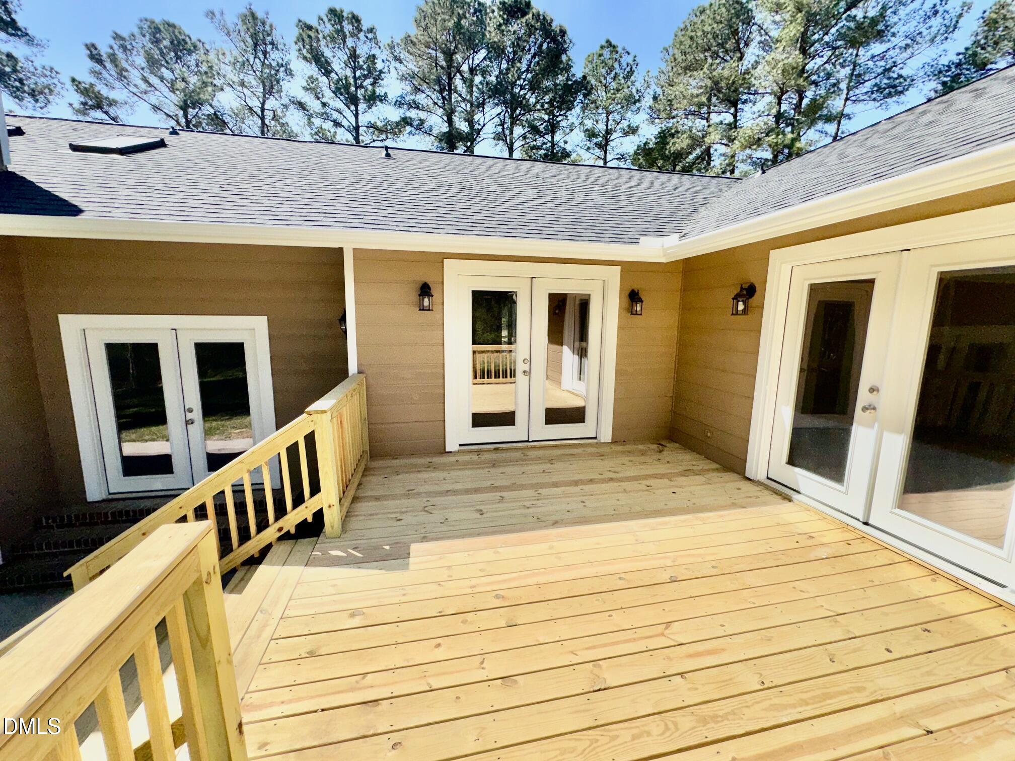 1720 Ross Mill Road Henderson, NC 27537 - Photo 31 of 42 a view of a house with a terrace