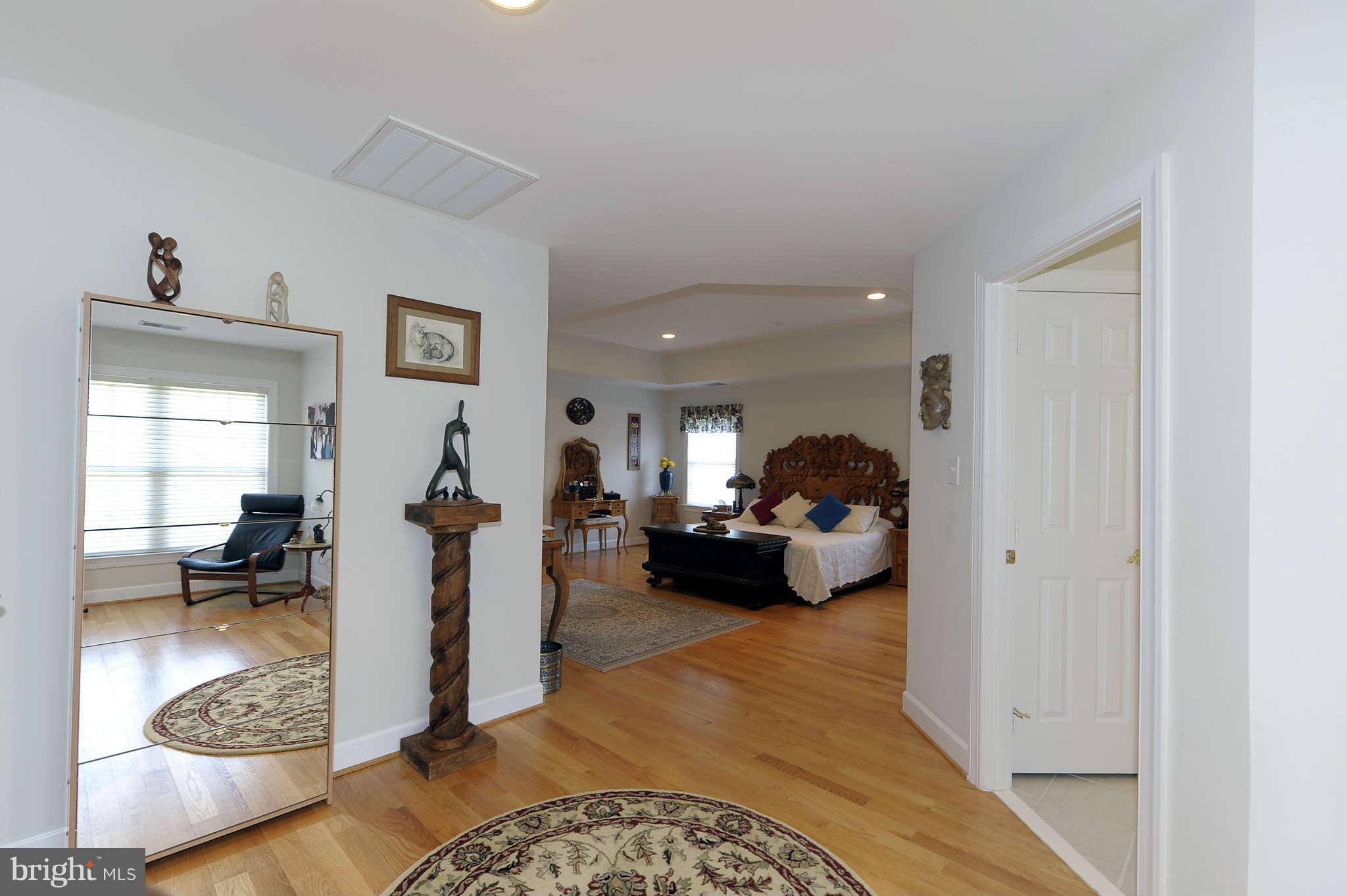 10404 Grey Fox Road Potomac, MD 20854 - Photo 15 of 30 a living room with furniture and a couch