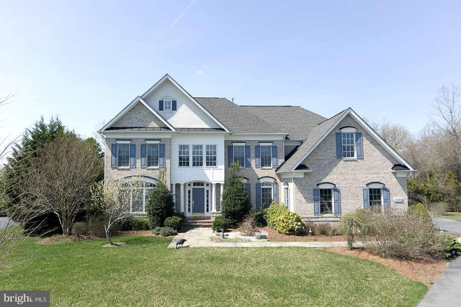 10404 Grey Fox Road Potomac, MD 20854 - Photo 30 of 30 a front view of a house with a yard