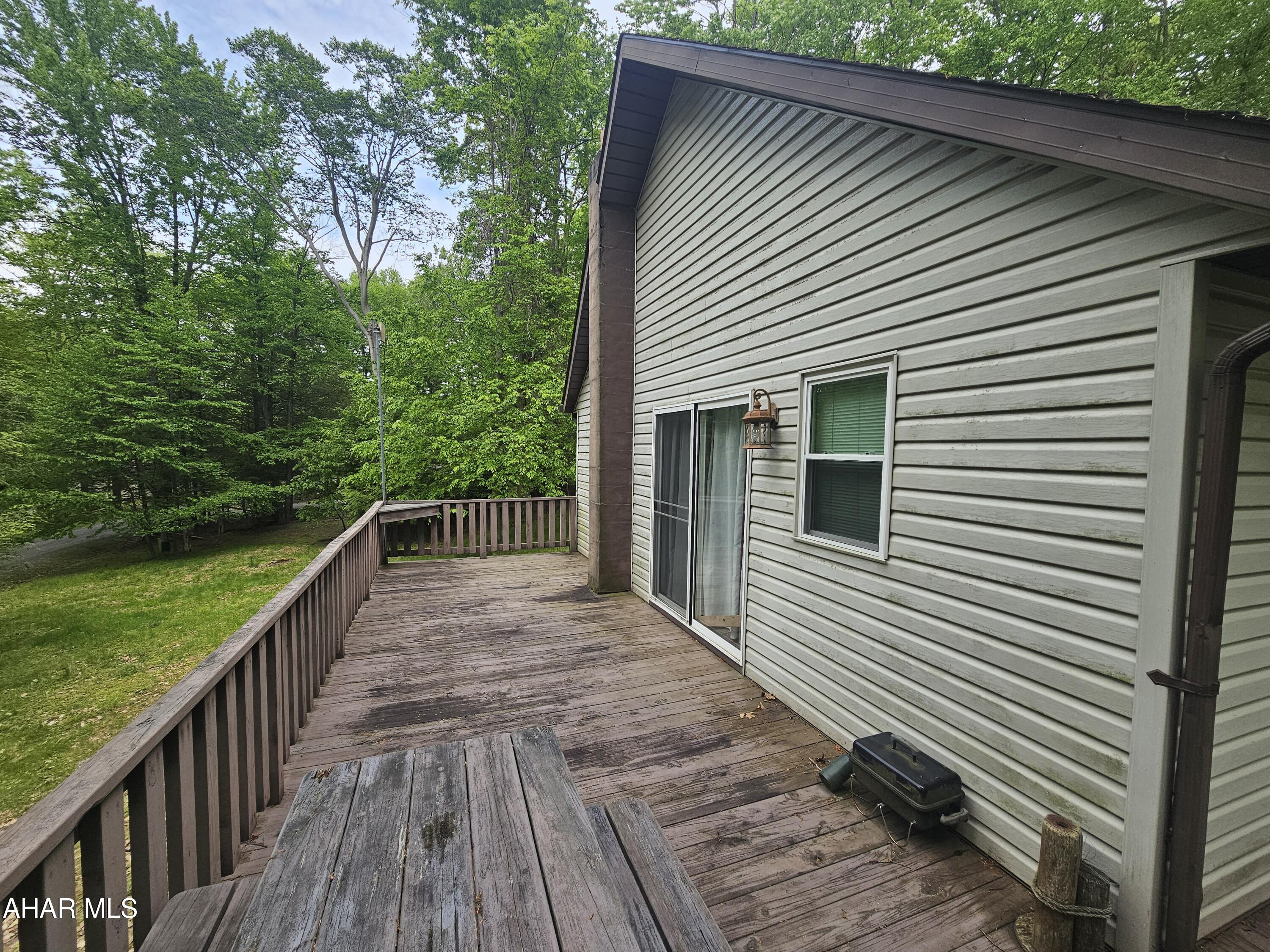 207 Kendrick Lane Flinton, PA 16640 - Photo 9 of 30 a view of a house with backyard and wooden floor