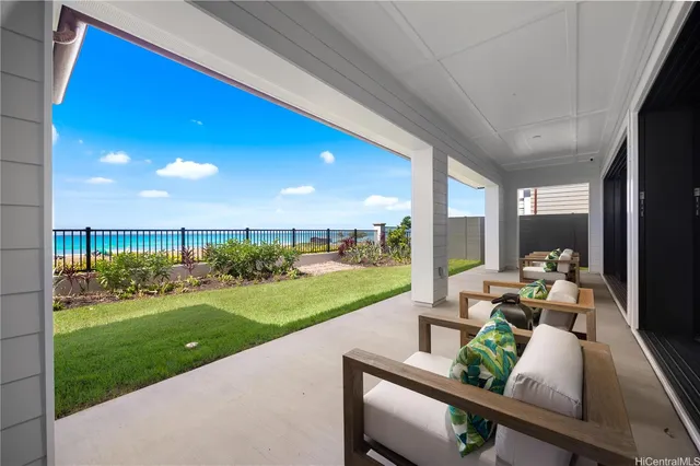 a view of a patio with chairs and a table