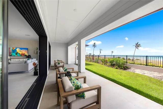 a view of a living room and a porch