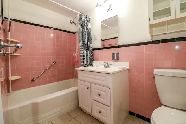 a bench sitting in front of a building