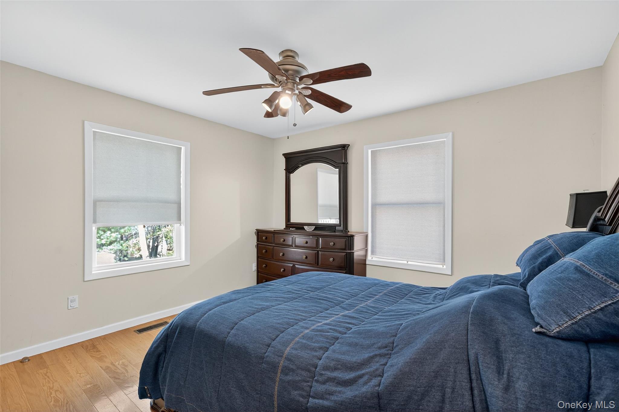 518 Sackett Lake Road Monticello, NY 12701 - Photo 20 of 44 a bedroom with a large bed and a window
