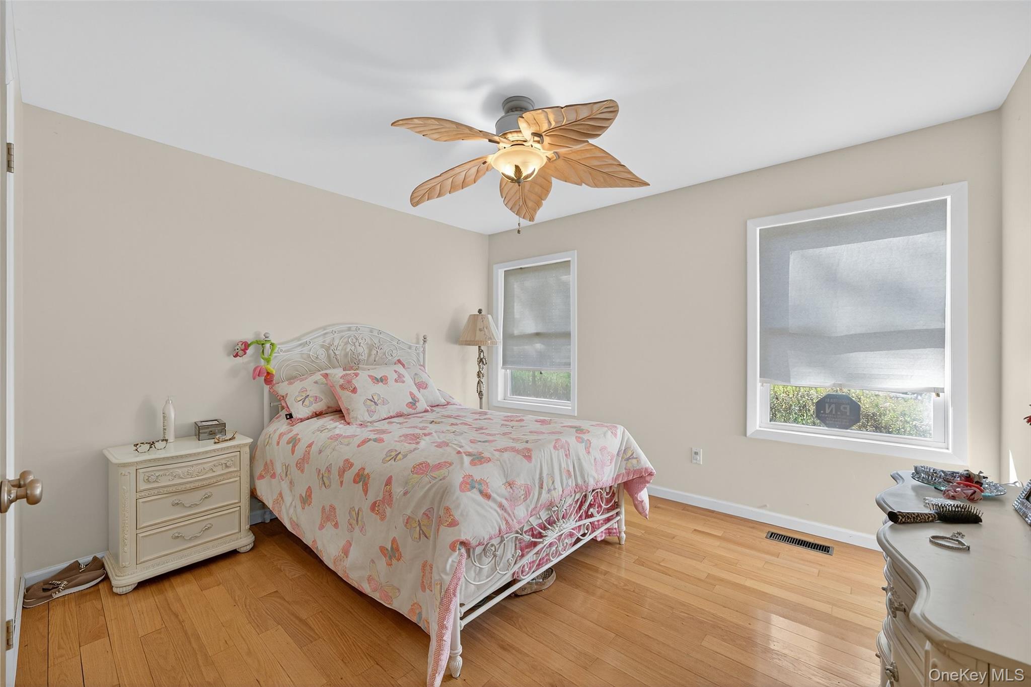 518 Sackett Lake Road Monticello, NY 12701 - Photo 22 of 44 a bedroom with a bed and window