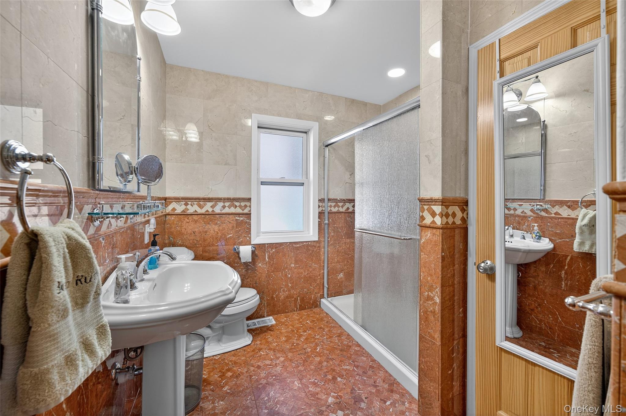 518 Sackett Lake Road Monticello, NY 12701 - Photo 24 of 44 a bathroom with a sink and a mirror