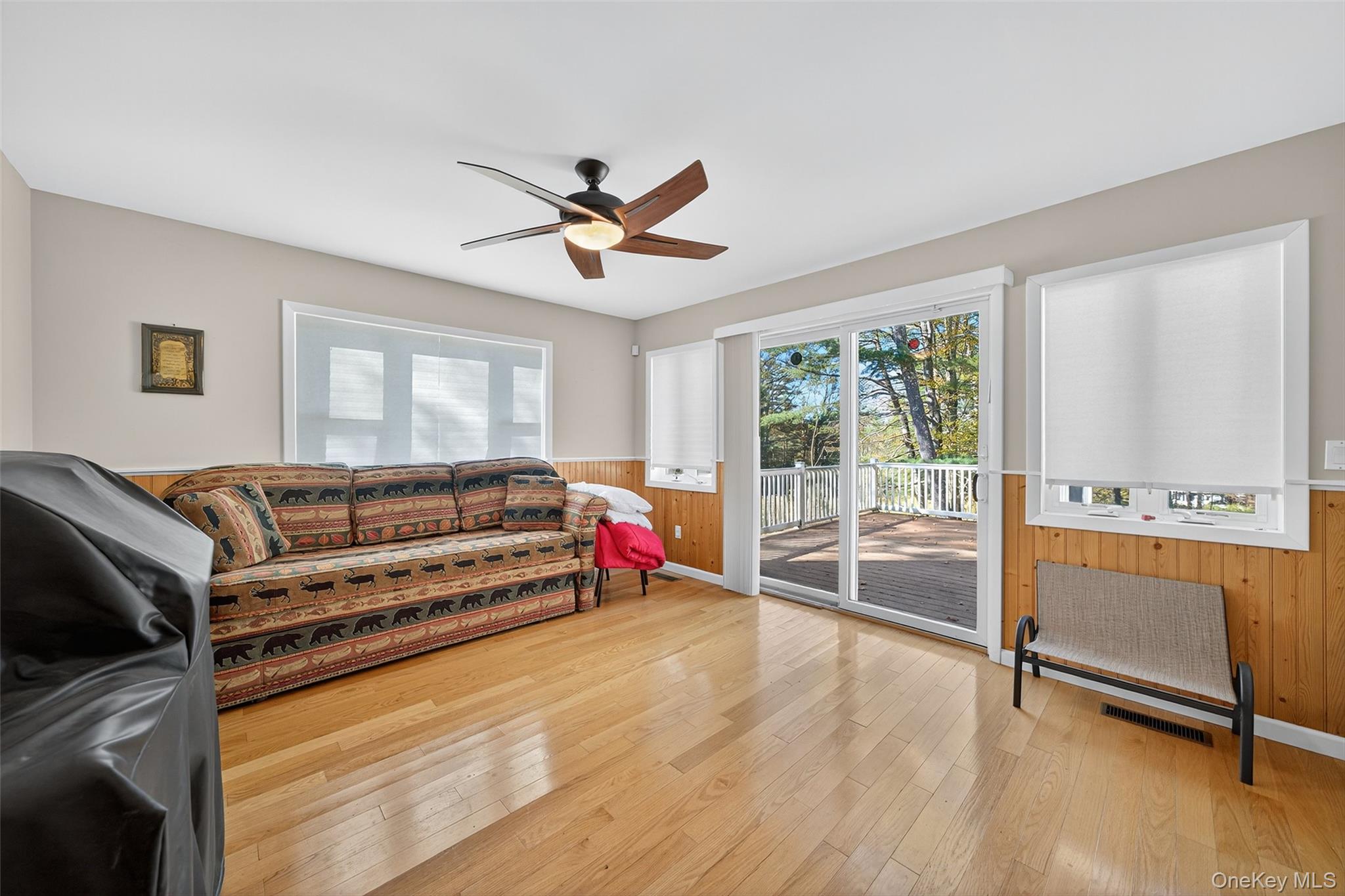 518 Sackett Lake Road Monticello, NY 12701 - Photo 25 of 44 a living room with furniture and a large window