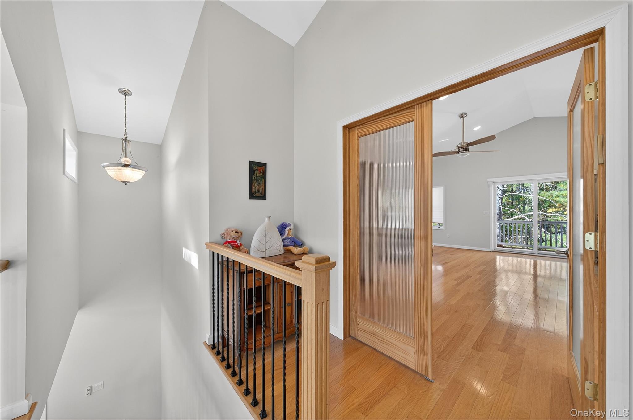 518 Sackett Lake Road Monticello, NY 12701 - Photo 29 of 44 a view of a hallway and a livingroom with wooden floor