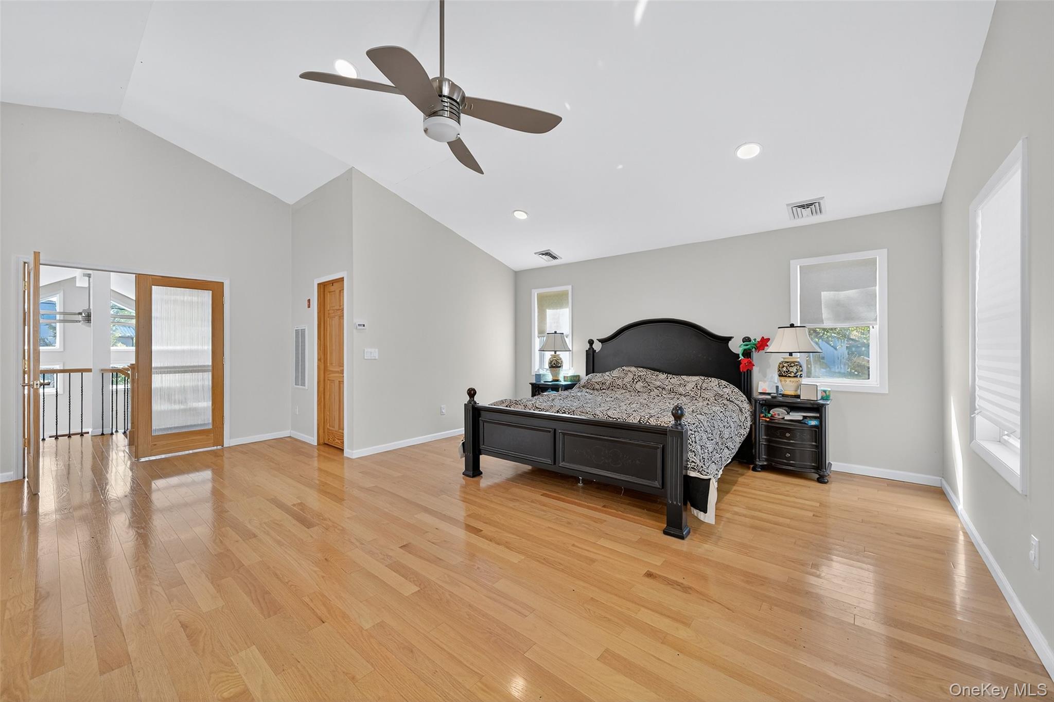 518 Sackett Lake Road Monticello, NY 12701 - Photo 32 of 44 a bedroom with furniture and wooden floor