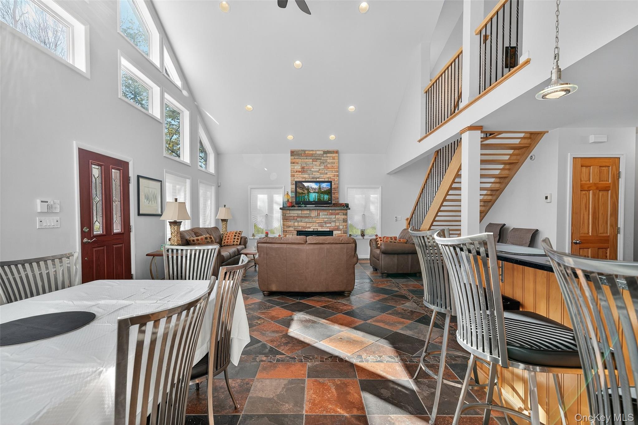 518 Sackett Lake Road Monticello, NY 12701 - Photo 10 of 44 a view of a livingroom with furniture and staircase