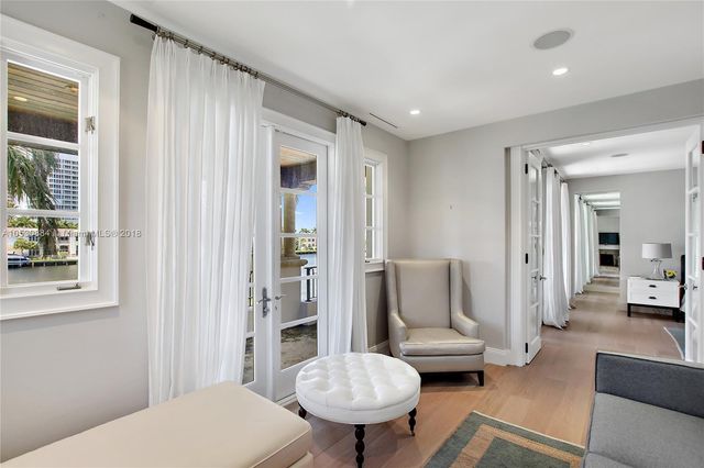 a view of walk in closet with clothes