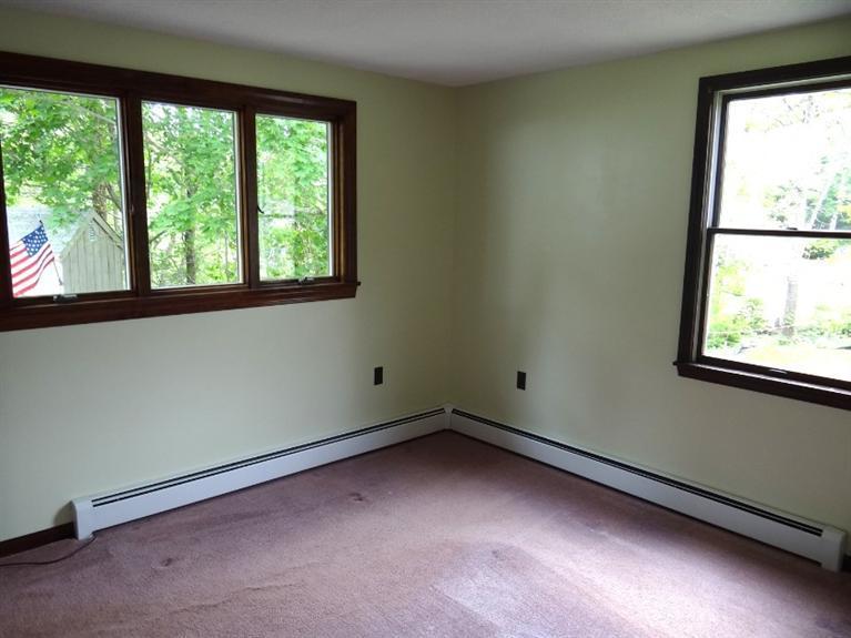 22 Millbrook Road Bourne, MA 02532 - Photo 25 of 25 an empty room with a window