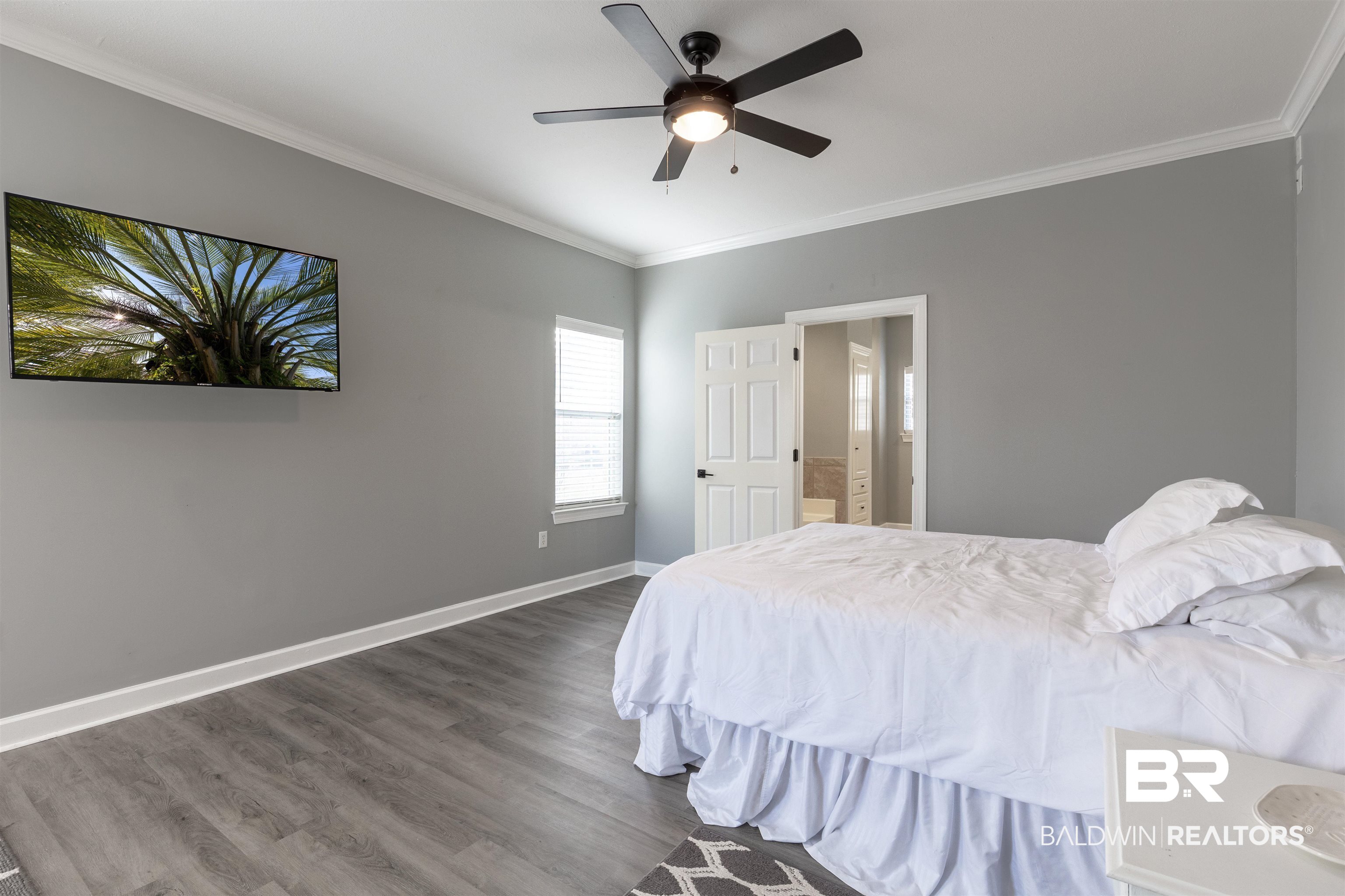 6436 Cherry Ridge Court West Mobile, AL 36695 - Photo 8 of 26 Bedroom featuring baseboards, crown molding, ceiling fan, and dark wood-style flooring